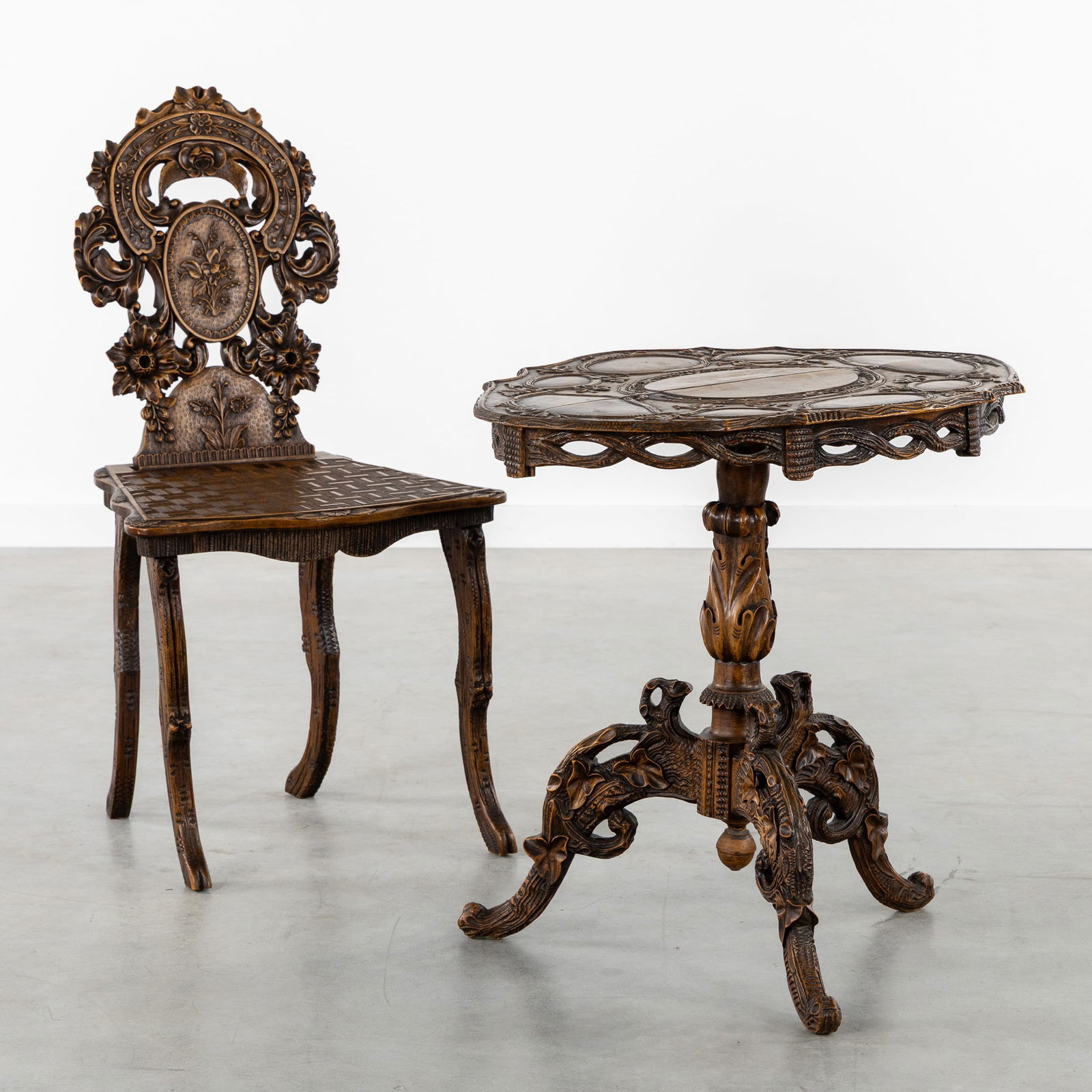 A Richly Sculptured Side Table with a matching Chair, Florally decorated, Black Forest, circa 1900. (1 of 9)
