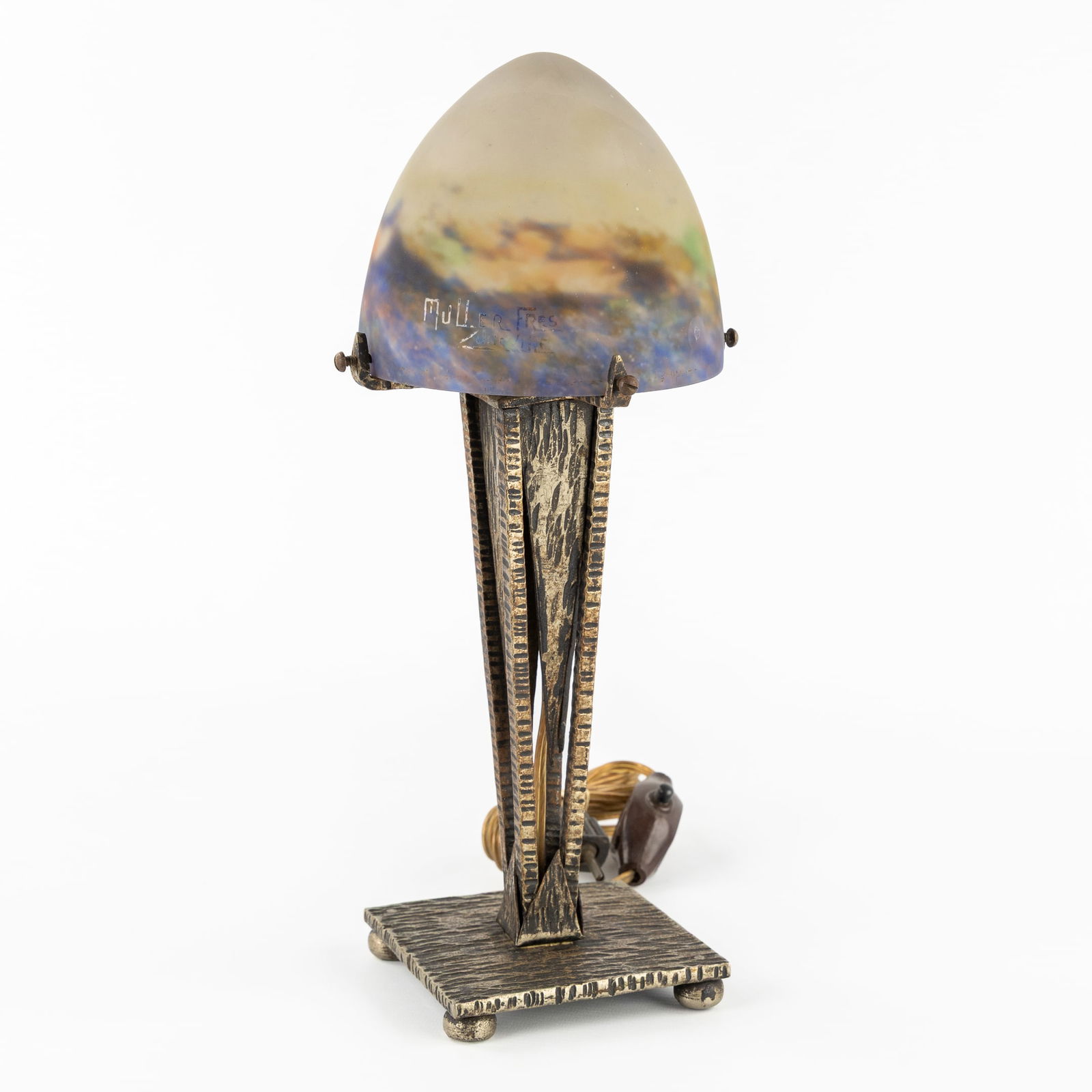 Muller Frères Luneville, A Pate de Verre Table Lamp. Art Deco, circa 1930.: Muller Frères Luneville, A Pate de Verre Table Lamp. Art Deco, circa 1930. A table lamp with a wrought iron base and a pate de verre lampshade.Signed on the edge of the lampshade.Art Deco, circa