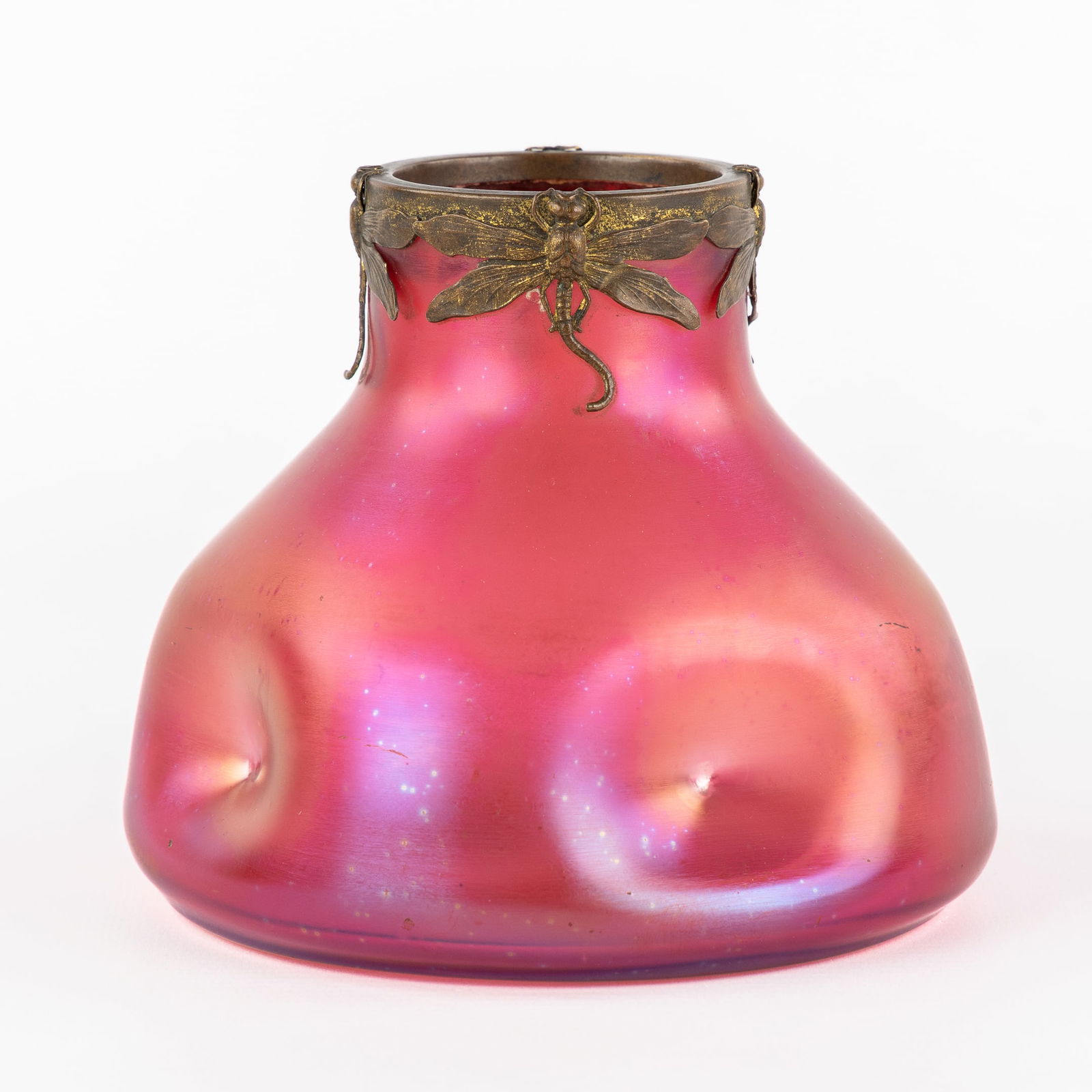 A Decorative Vase, Iridescent Glass, Brass Mount with Dragonflies, in the Style of Loetz, Art: A Decorative Vase, Iridescent Glass, Brass Mount with Dragonflies, in the Style of , Art Nouveau, Jugendstil, circa 1900. Violet iridescent glass.Brass mount, decorated with dragonflies.In the