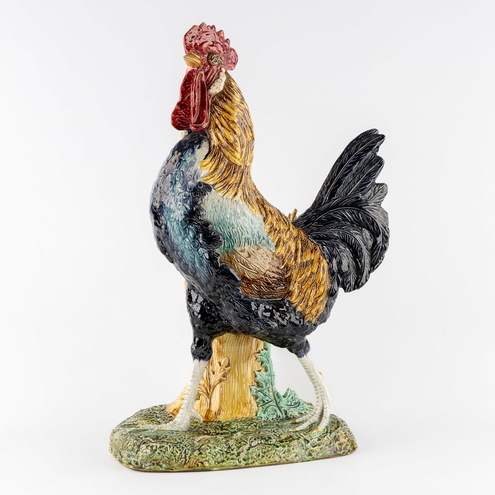 Paul Comolera (1818-c.1897) (Attr.) 'Rooster', a vase with a large rooster, glazed ceramic.: Paul Comolera (1818-c.1897) (Attr.) 'Rooster', a vase with a large rooster, glazed ceramic. Glazed ceramic.Vase in the shape of a sheaf of wheat, with a large rooster in a field with ears of wheat.Uns