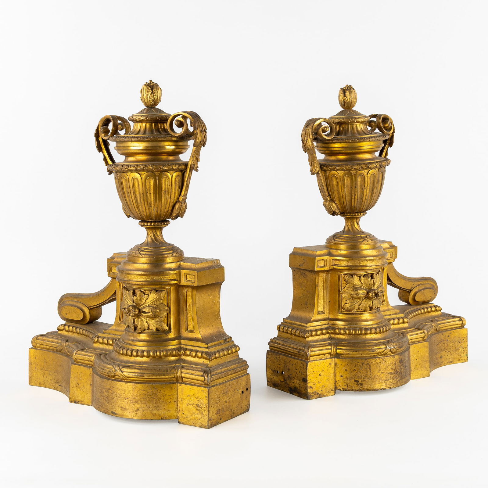 A Pair of Finely Decorated Andirons or Fire-place Bucks, Bronze, Louis XVI style. 19th C.: A Pair of Finely Decorated Andirons or Fire-place Bucks, Bronze, Louis XVI style. 19th century. Bronze. Decorated with sculptured braziers and moldings. Louis XVI style. 19th century.