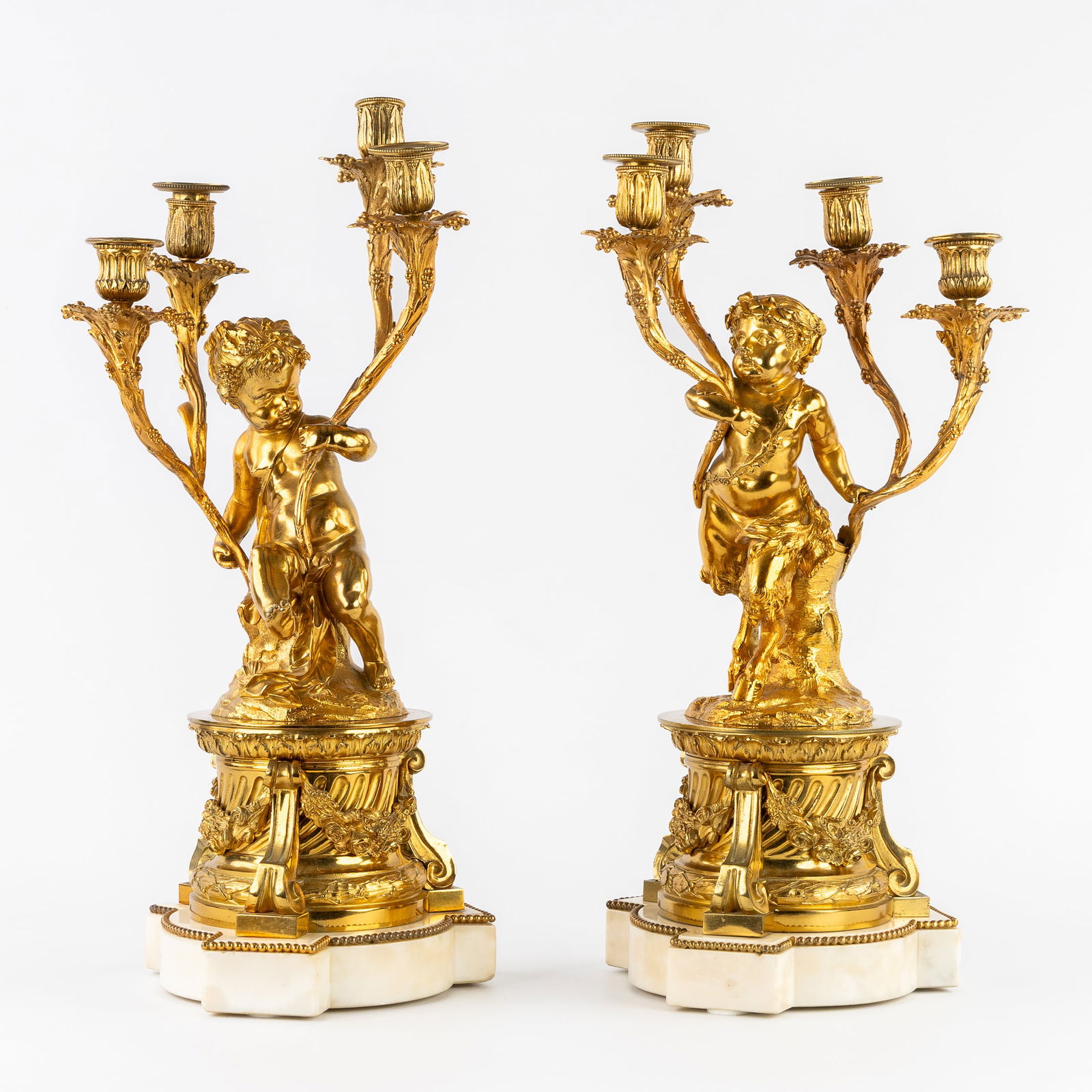 A Pair of Candelabra, Mounted with a Faun and a Putto, Gilded Bronze and Marble, Louis XVI style, (1 of 9)