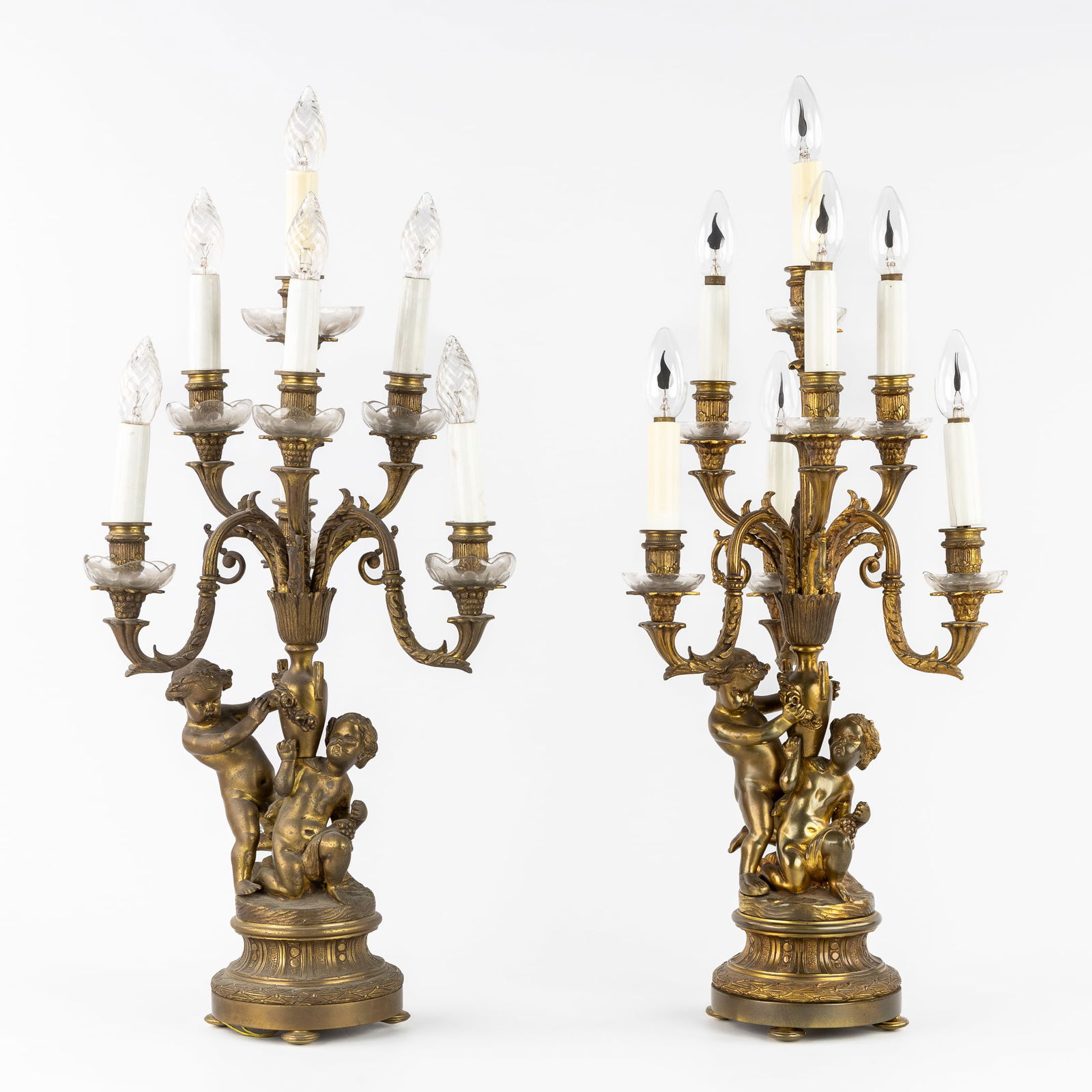 A Pair of Bronze Candelabra, Decorated with Putti, Neoclassical style. (1 of 8)