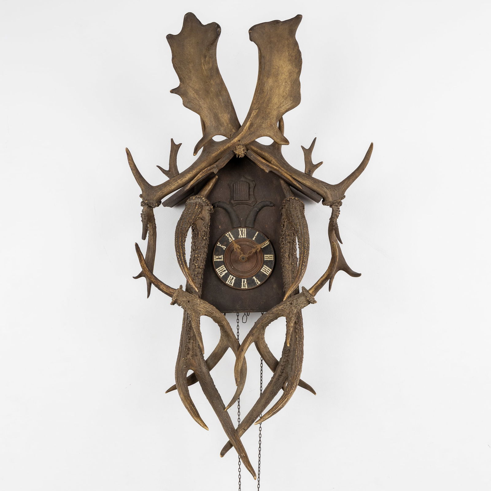 A Cuckoo Clock decorated with Deer Antlers, Black Forest, circa 1900. (1 of 10)