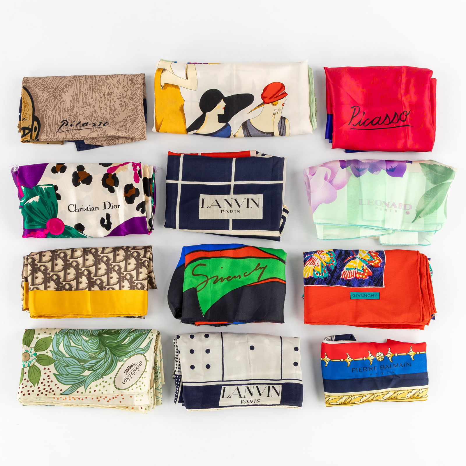 A Collection of 12 Silk Scarves, Dior, Longchamp, Lanvin, Leonard, Givenchy, and others. (1 of 14)