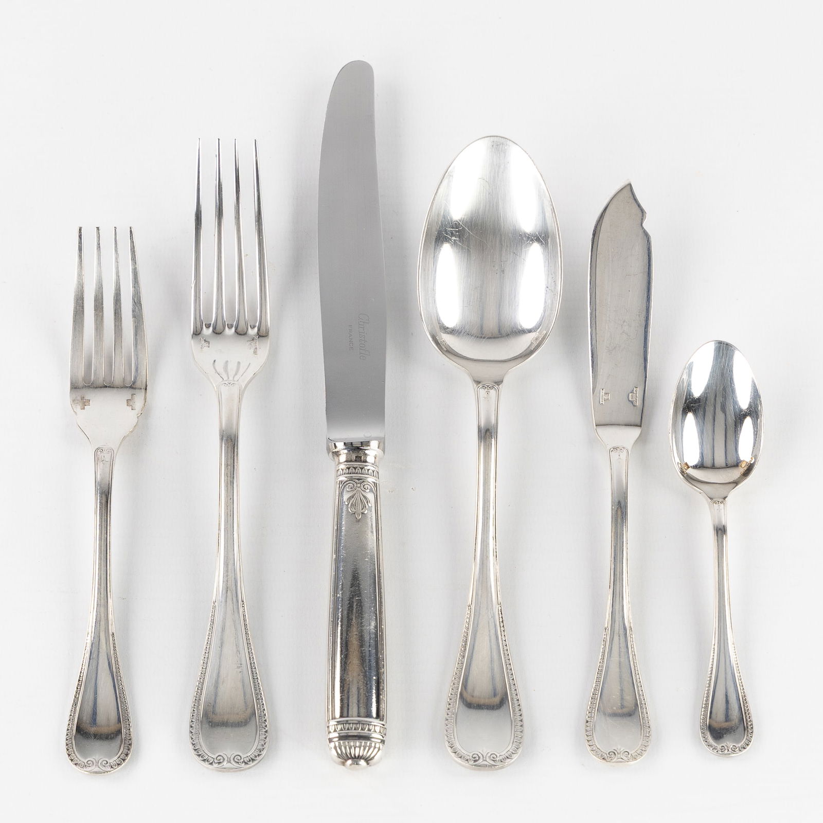 Christofle, Malmaison, A 36-piece Silver-Plated Cutlery Set.: Christofle, Malmaison, A 36-piece Silver-Plated Cutlery Set. Silver-plated metal. Malmaison model.6 large spoons6 large knives6 large forks 6 fish forks6 fish knives 6 coffee spoons Marked Christofle