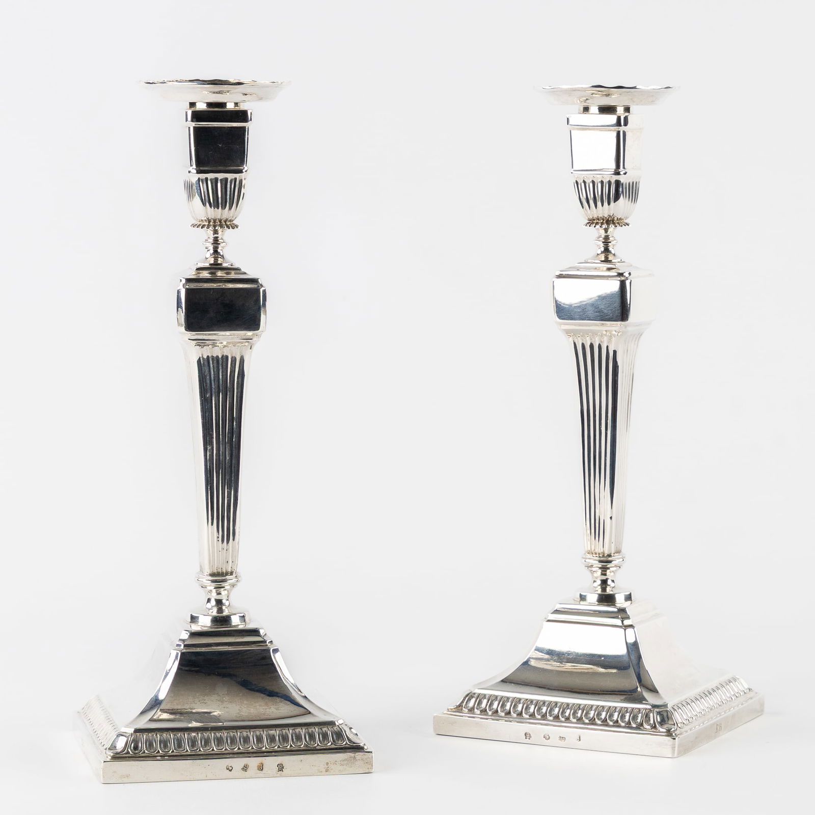 Petrus Josephus Dupret (act. 1767-1798) A Pair of Silver Neoclassical Candlesticks, Louis XVI,: Petrus Josephus Dupret (act. 1767-1798) A Pair of Silver Neoclassical Candlesticks, Louis XVI, Ghent, 1791. Silver. A pair of silver candlesticks.Neoclassical style, Louis XVI period.Silver. City