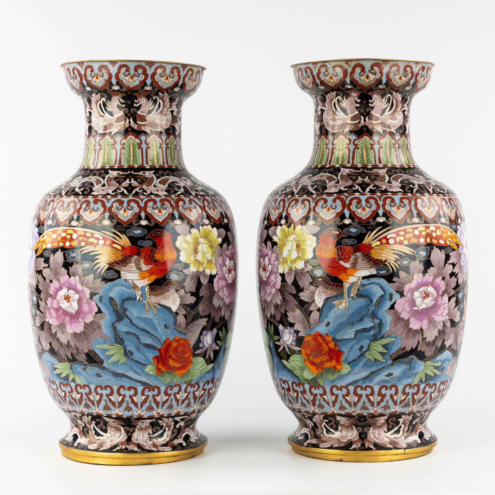 A Pair of large Oriental cloisonné vases with a floral and bird design. 20th C. (1 of 6)