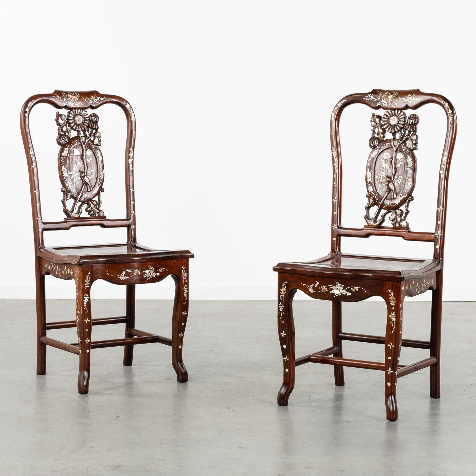 A Pair of Chinese chairs, Sculptured hardwood with Mother-of-Pearl inlay. 20th C. (1 of 8)