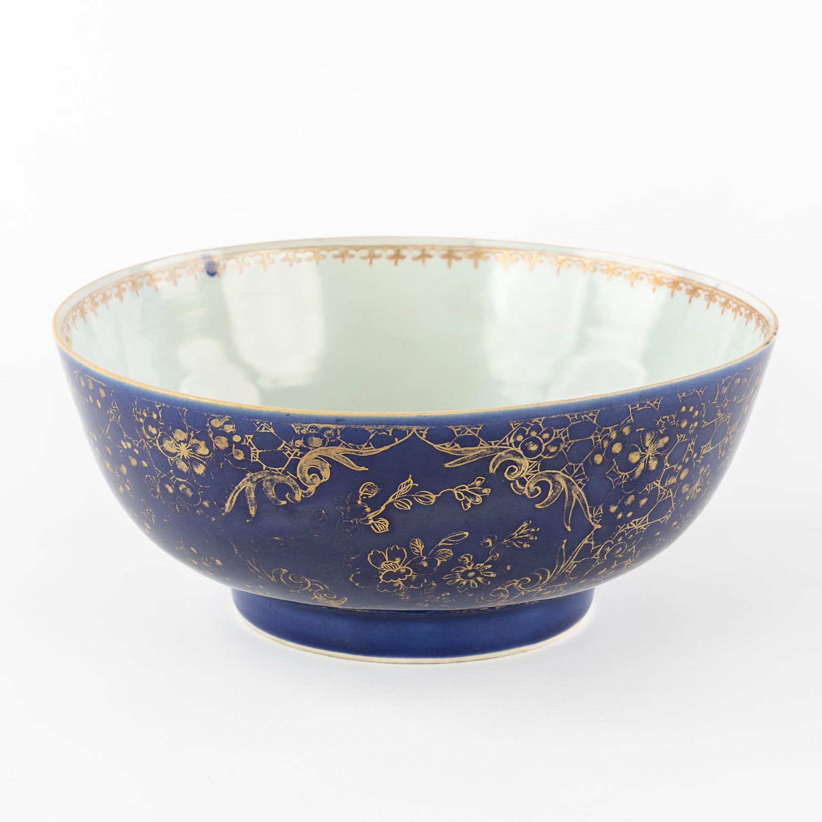 A Large Chinese powder-blue bowl with gilded floral decoration, Qianlong. (1 of 7)