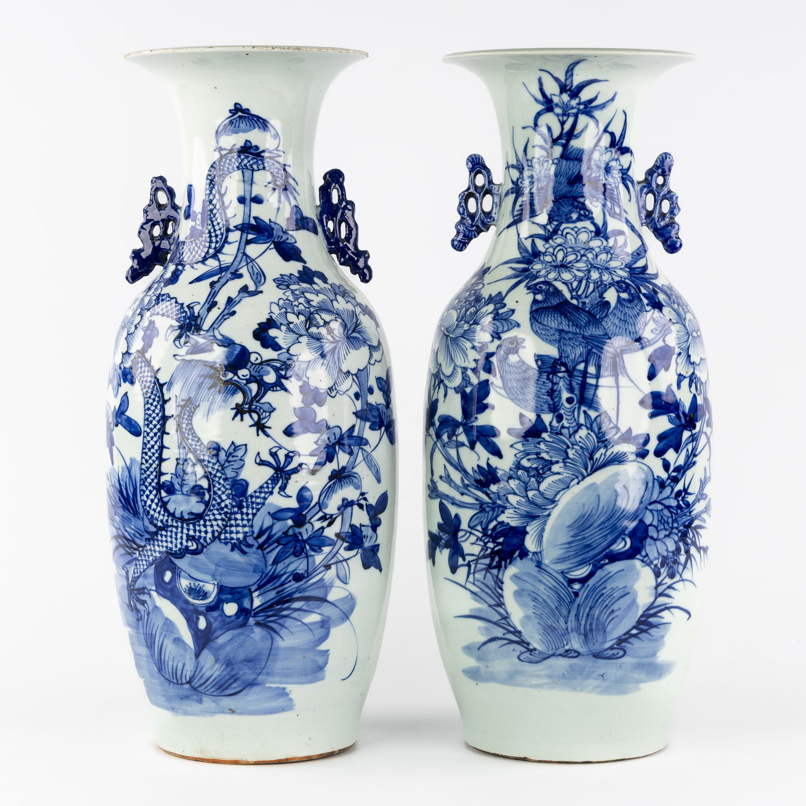 Two Chinese Celadon vases, blue and white decorated with a Dragon and Birds, 19th/20th C.: Two Chinese Celadon vases, blue and white decorated with a Dragon and Birds, 19th/20th century. Chinese porcelain.Vase, blue and white decorated with a dragon and peonies (H: 57 cm).Vase, blue and w