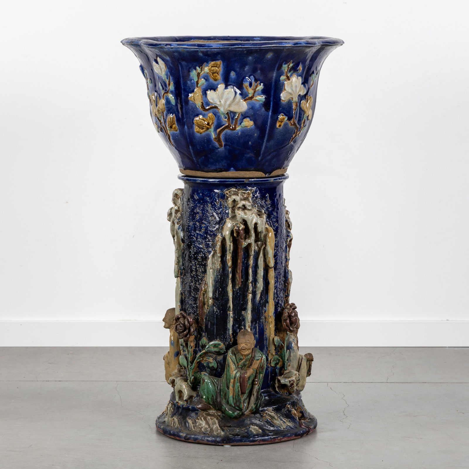 A Chinese jardinière on a pedestal, Polychrome terracotta, decorated with Wise Men, Shiwan, 19th C.: A Chinese jardinière on a pedestal, Polychrome terracotta, decorated with Wise Men, Shiwan, 19th century. Chinese terracotta, polychrome glaze.Jardinière or cache-pot, mounted on a pedestal.Decorate