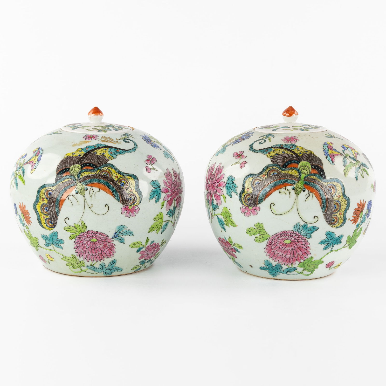 A Pair of Chinese ginger jars, Famille Rose, florally decorated with butterflies, 19th C. (1 of 8)