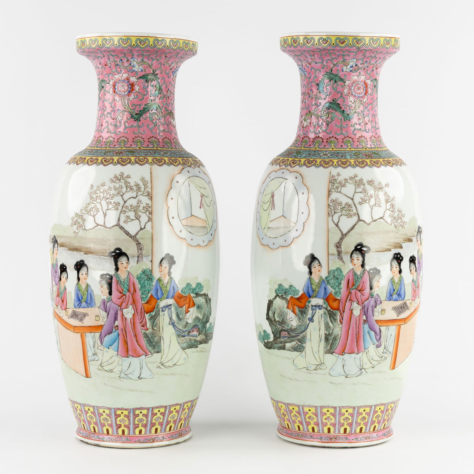 A Pair of Chinese Famille Rose Vases, Decorated with Court Ladies in the Garden, Qianlong marked. (1 of 9)