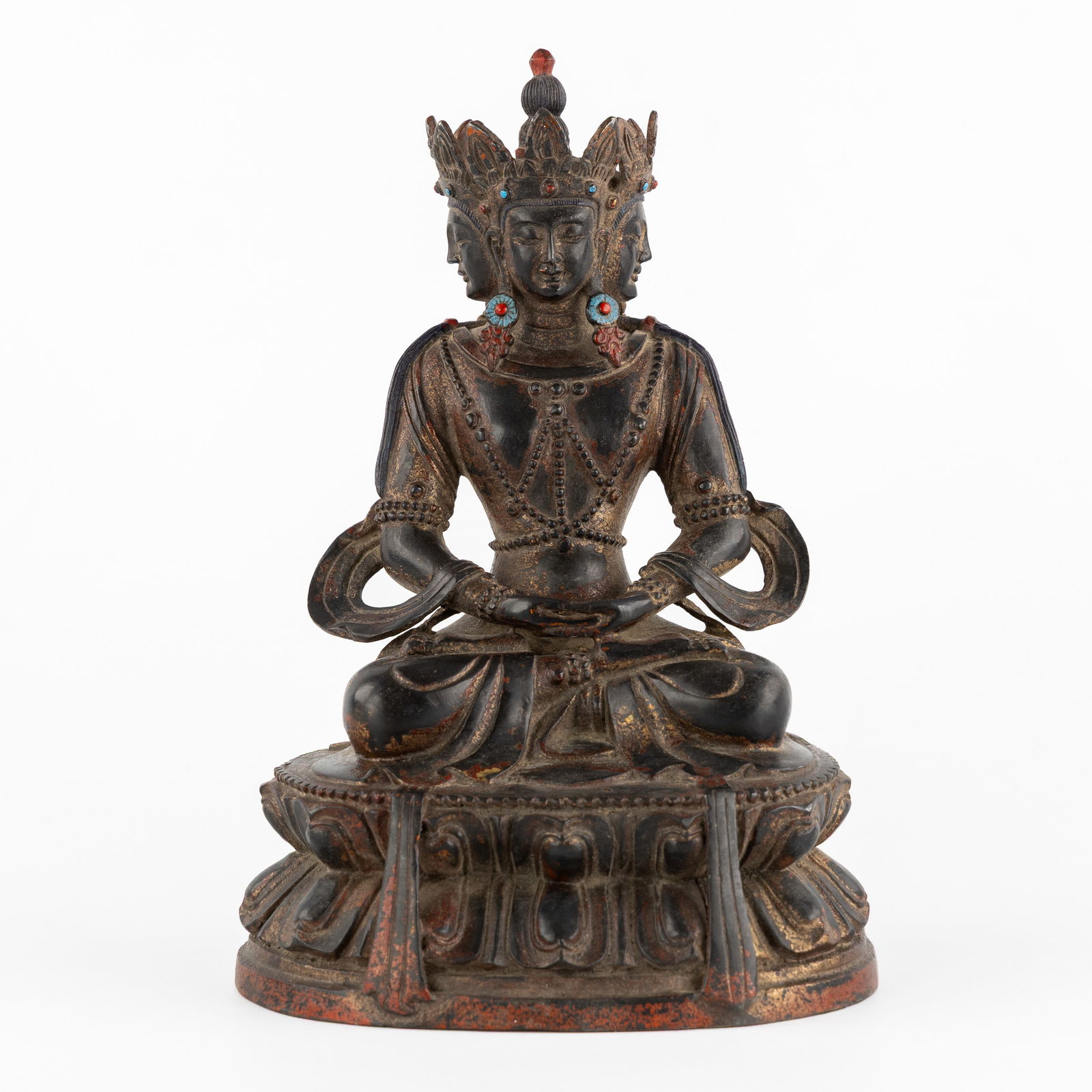 A Bronze sculpture of the three-faced Buddha Guanyin, patinated bronze. 19th/20th C. (1 of 6)