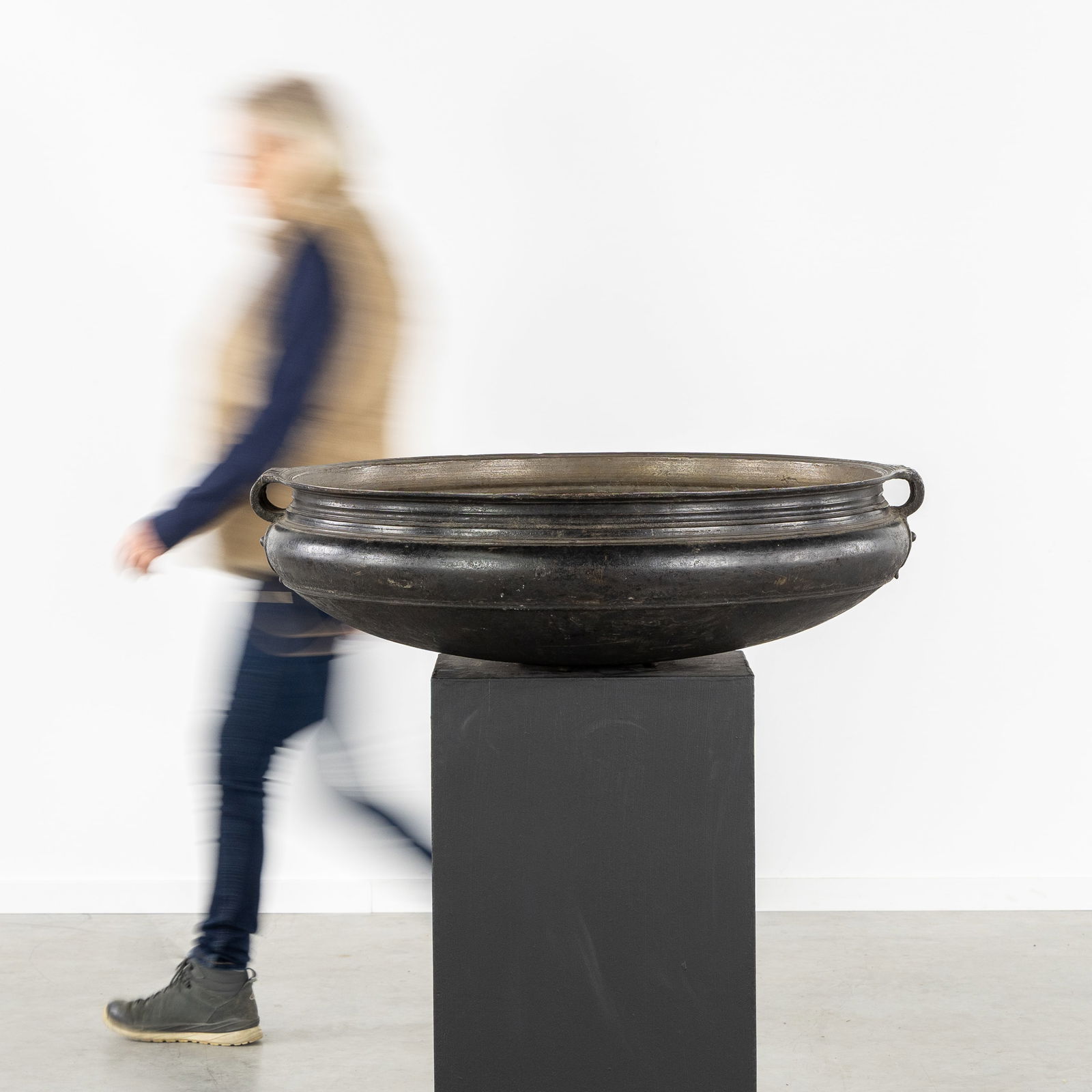 A Large bronze Urli or temple bowl, India, 19th C.: A Large bronze Urli or temple bowl, India, 19th century. Bronze. Temple bowl / Urli / Ourli Mounted on four small feet. India, late 19th century. (85 x 35 x 0 cm)