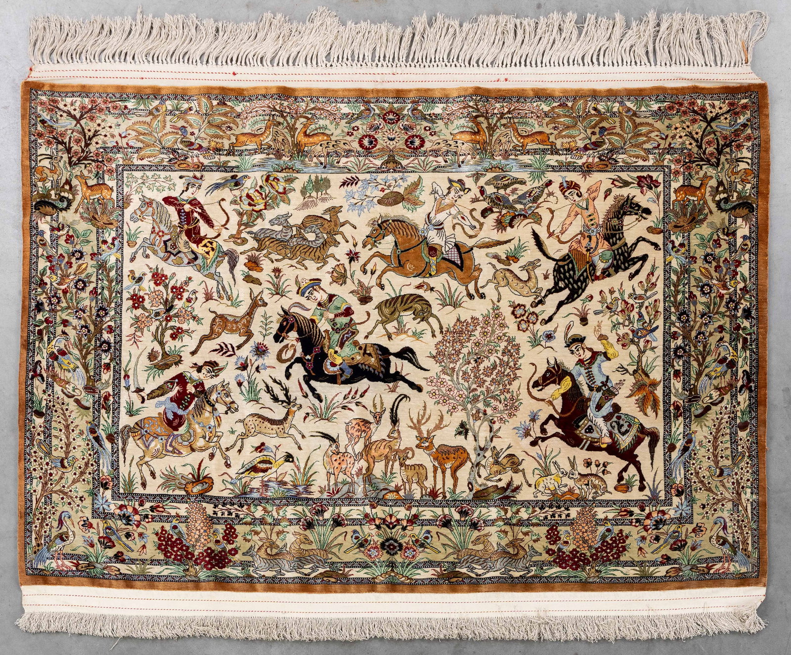 An Oriental hand-made carpet, silk, Ghom, Iran (108 x 149 cm). (1 of 8)