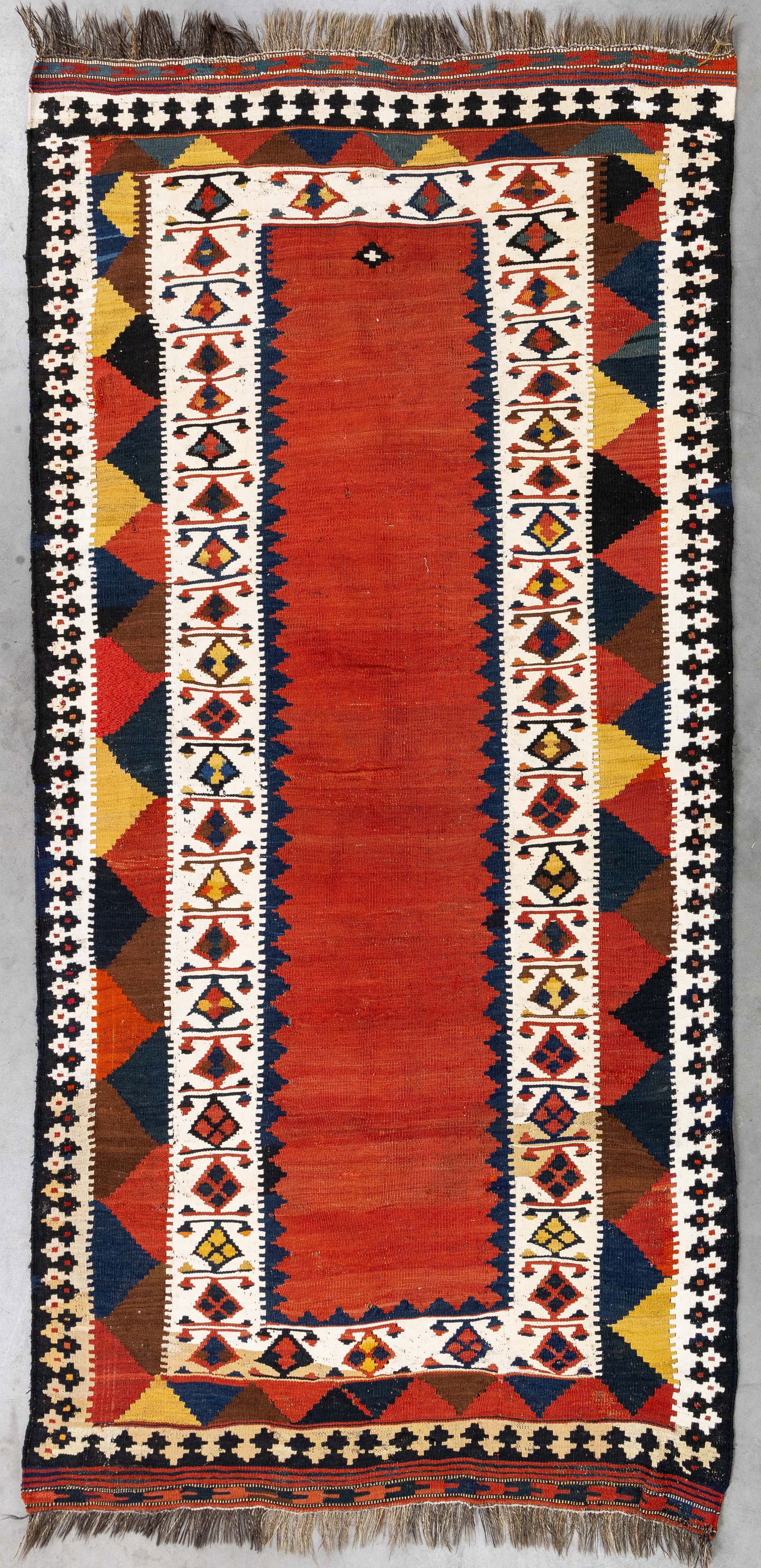 An Oriental hand-made kilim, Lori, Iran (247 x 125 cm). (1 of 7)