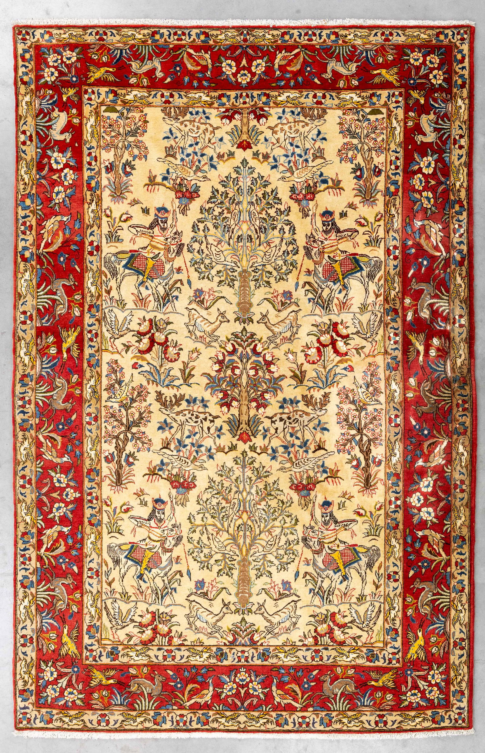 An Oriental hand-made carpet, Ghoum, Iran (219 x 143 cm). (1 of 7)