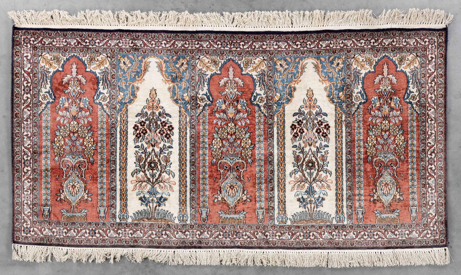 An Oriental hand-made carpet, Kashmir, India (181 x 94 cm). (1 of 6)