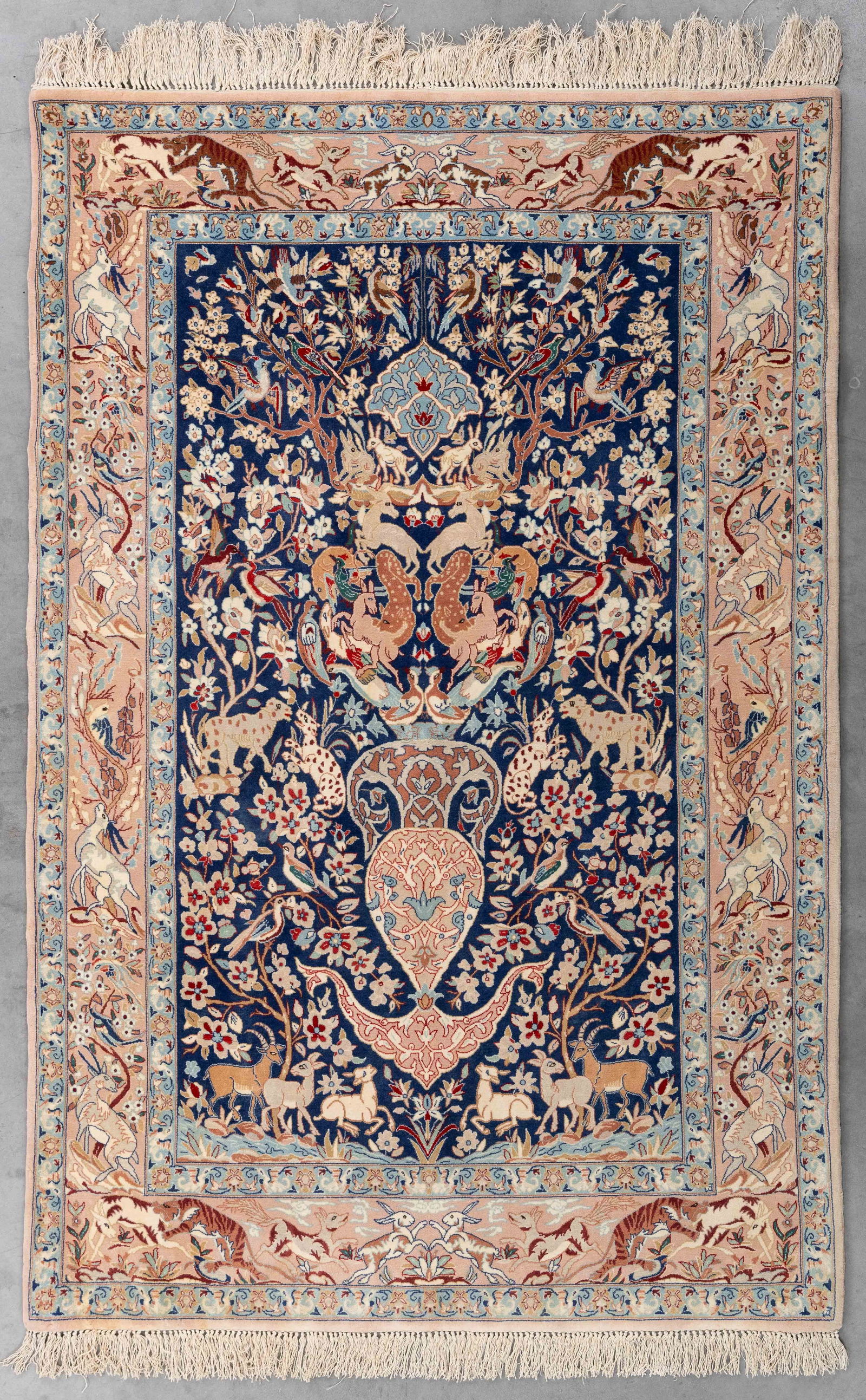 An Oriental hand-made carpet, Isfahan, Iran (156 x 103 cm). (1 of 8)