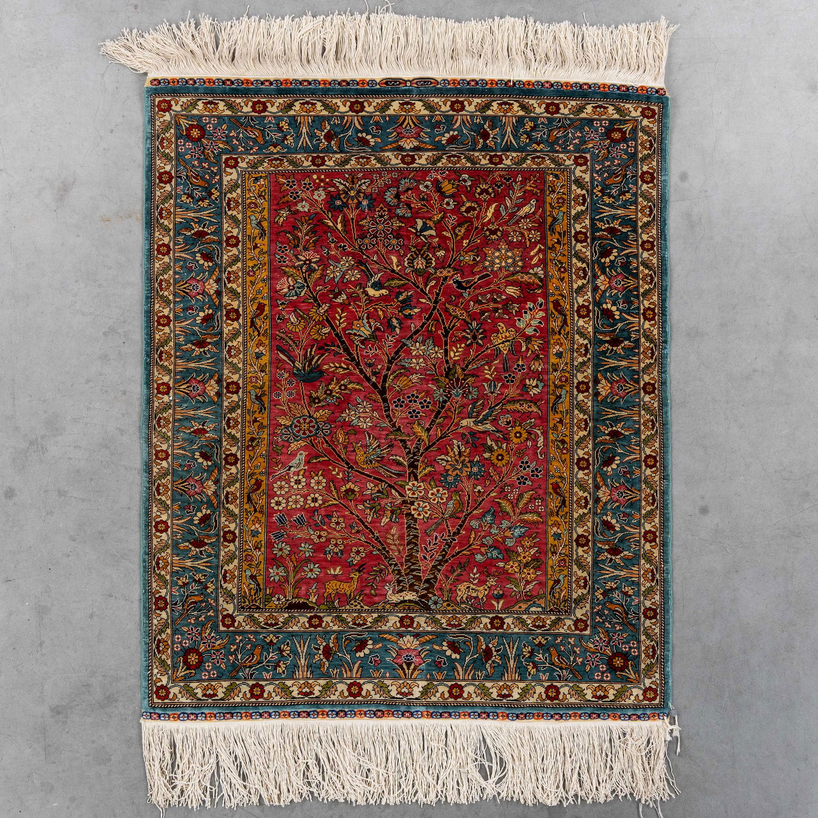 An Oriental hand-made carpet, Silk, Hereke, Turkiye (84 x 69 cm). (1 of 6)