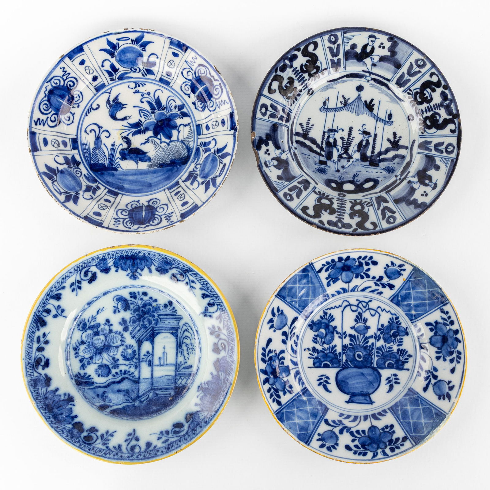 A collection of four blue and white Delftware plates, late 17th/18th C. (1 of 10)