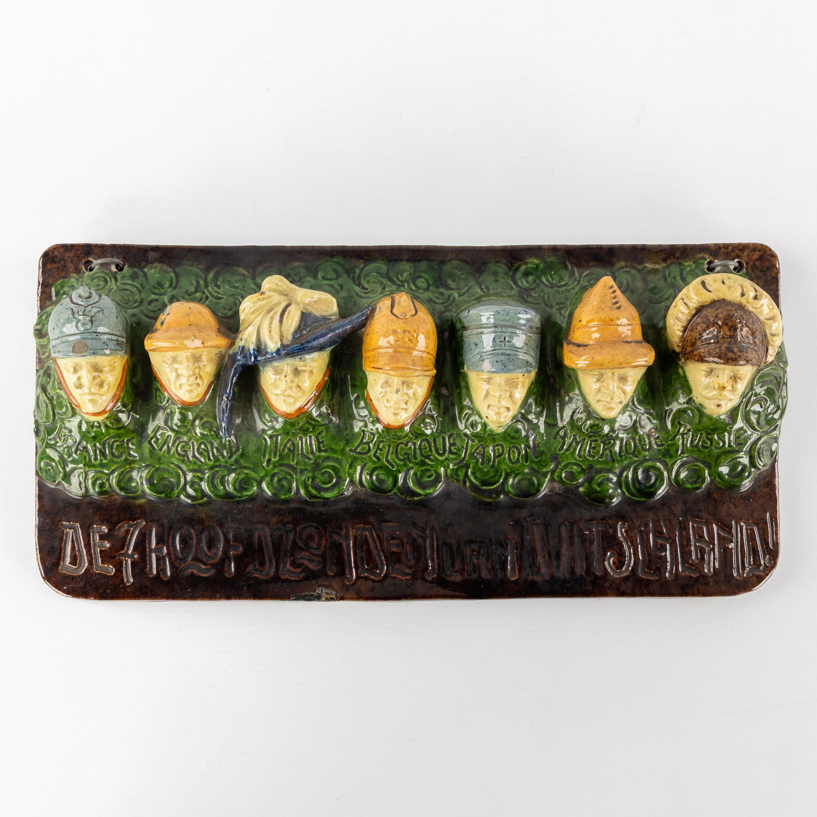 Flemish Pottery, A Pipe Rack 'De 7 Hoofdzonden van Duitsland', Société de Potterie Flamande,: Flemish Pottery, A Pipe Rack 'De 7 Hoofdzonden van Duitsland', Société de Potterie Flamande, Courtrai, circa 1920. Polychrome glazed pottery.