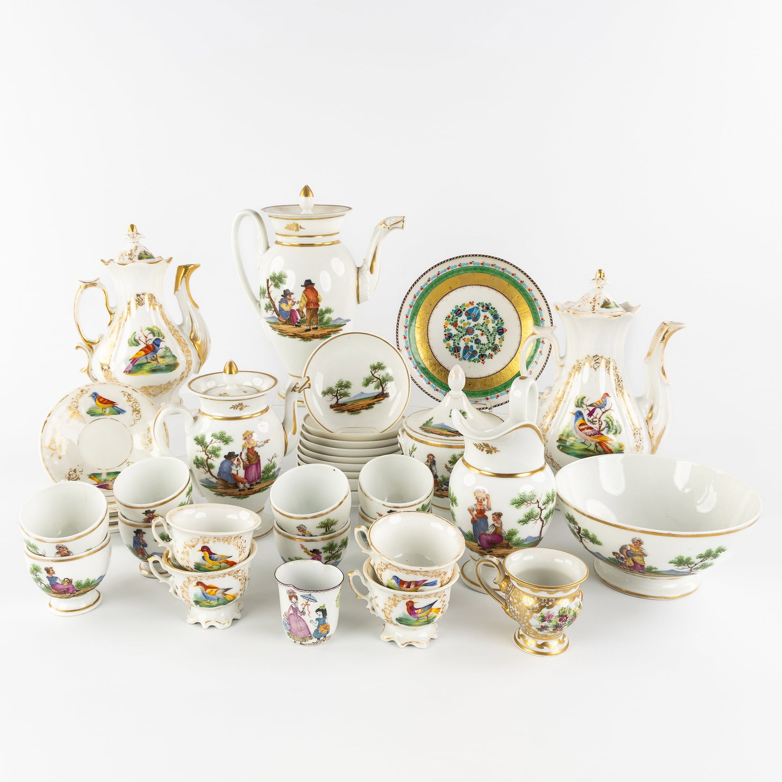 A 35-piece Composed Coffee and Tea Set, polychrome and gilded porcelain, 20th C.: A 35-piece