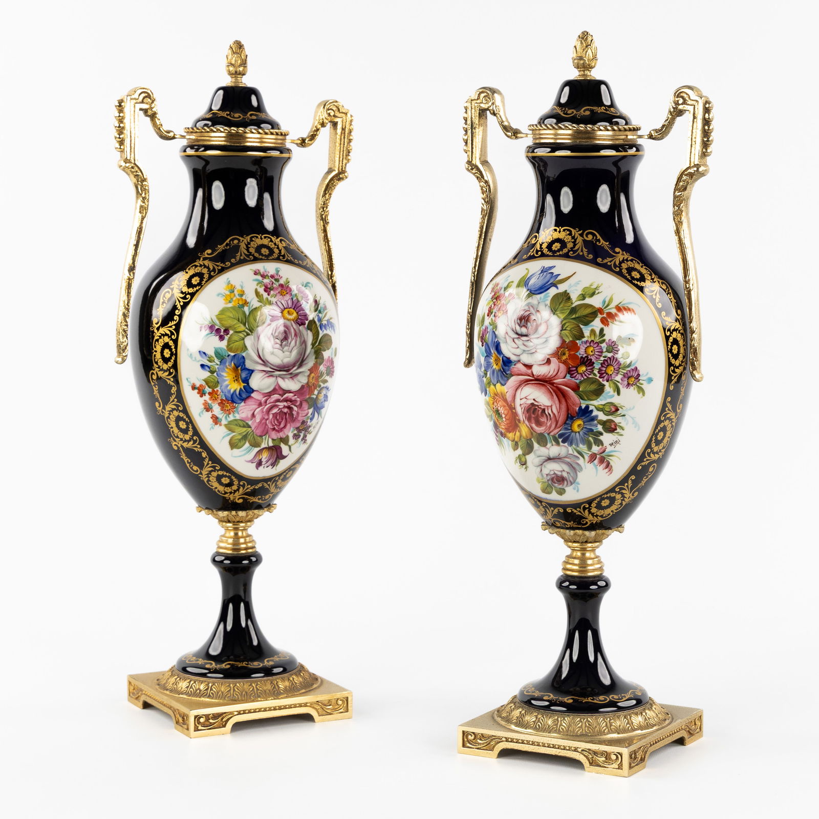 A Pair of decorative cobalt blue covered vases, Sèvres style, mounted with gilded bronze, 20th C. (1 of 8)