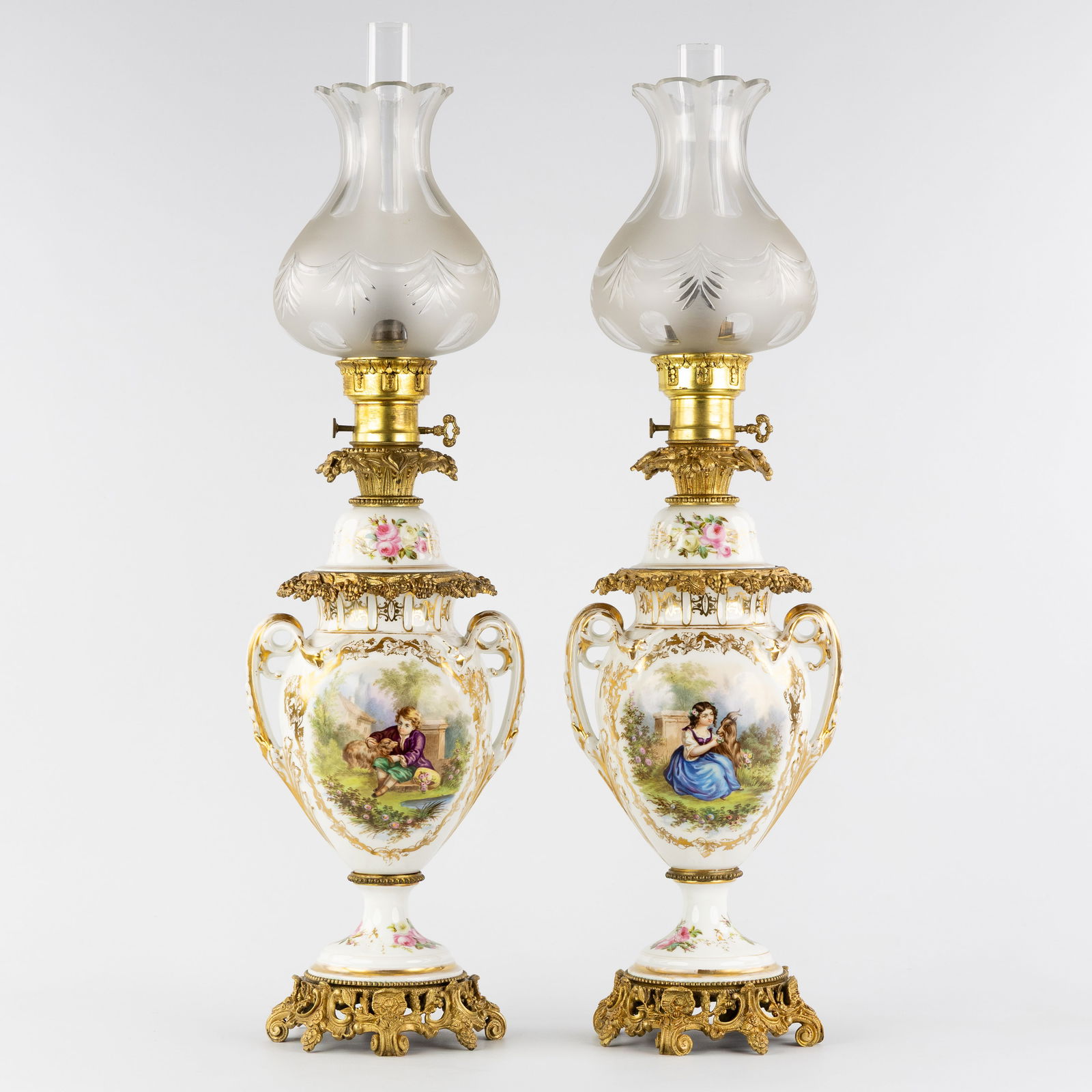 A Pair of Large Porcelain oil lamps, hand-painted decorations, mounted with bronze and cut glass, (1 of 9)