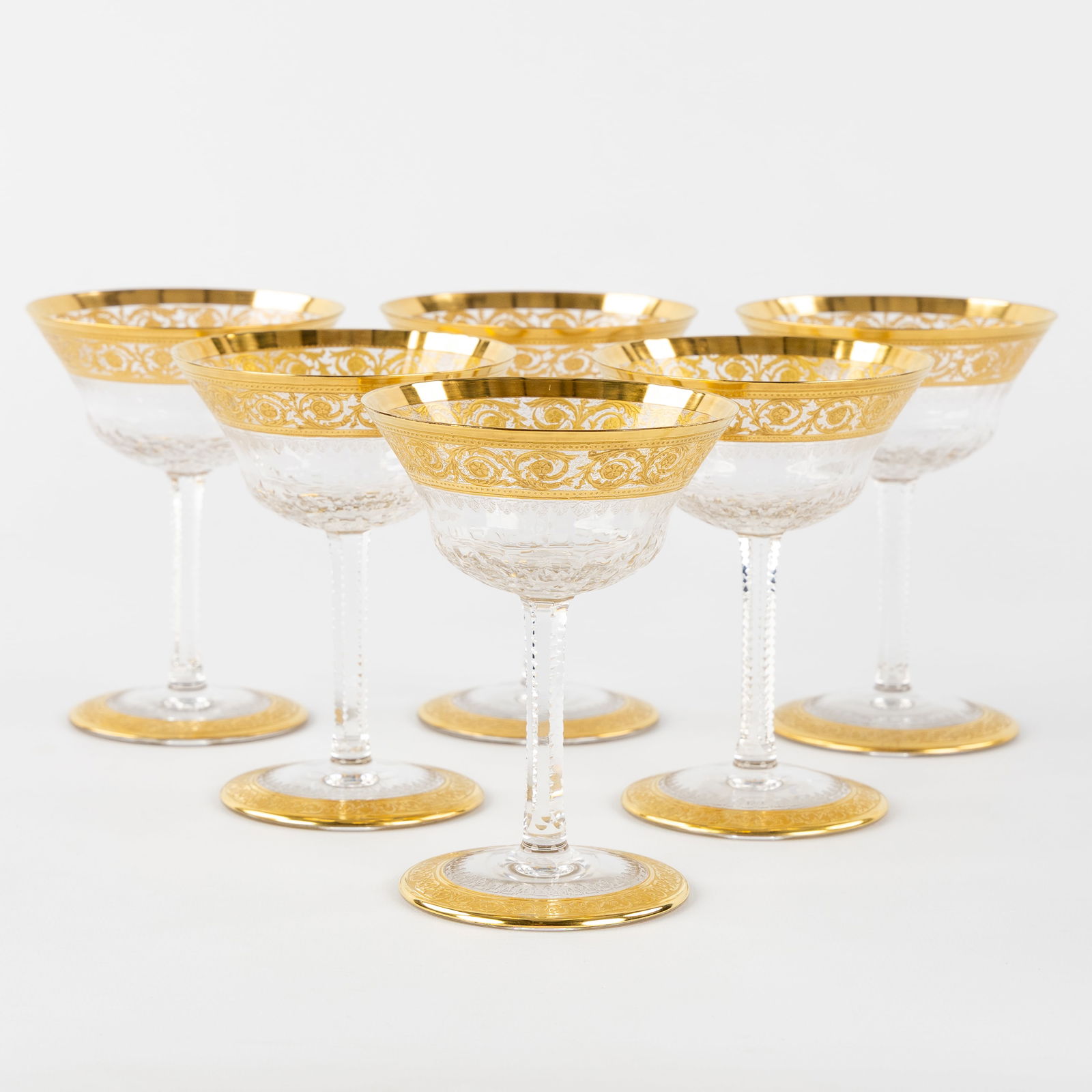 Saint Louis, 'Thistle Gold', a Set of 6 Champagne Coupes, Engraved Decorations and Etched Gold: Saint Louis, 'Thistle Gold', a Set of 6 Champagne Coupes, Engraved Decorations and Etched Gold Decorations. Six champagne coupes, cut and etched crystal.Decor 'Thistle Gold'.All signed 'Saint Louis