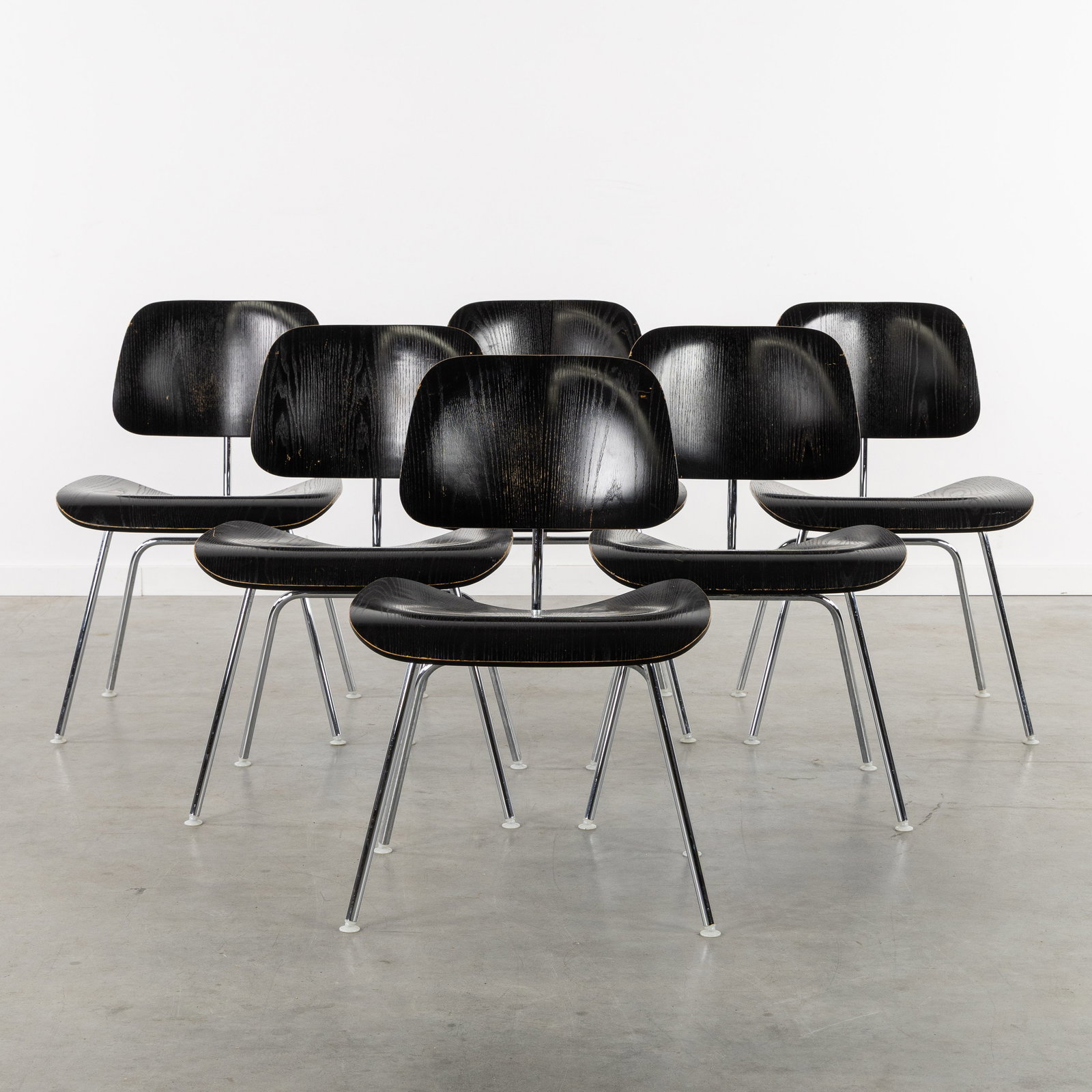 Charles & Ray Eames (XX-XXI) 'LCM', a set of 6 chairs, for Herman Miller, black plywood and (1 of 9)