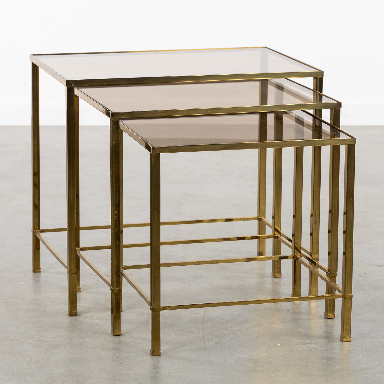 A Set of Three Nesting tables with Tinted glass, in the style of Marc du Plantier. Circa 1960. (1 of 6)