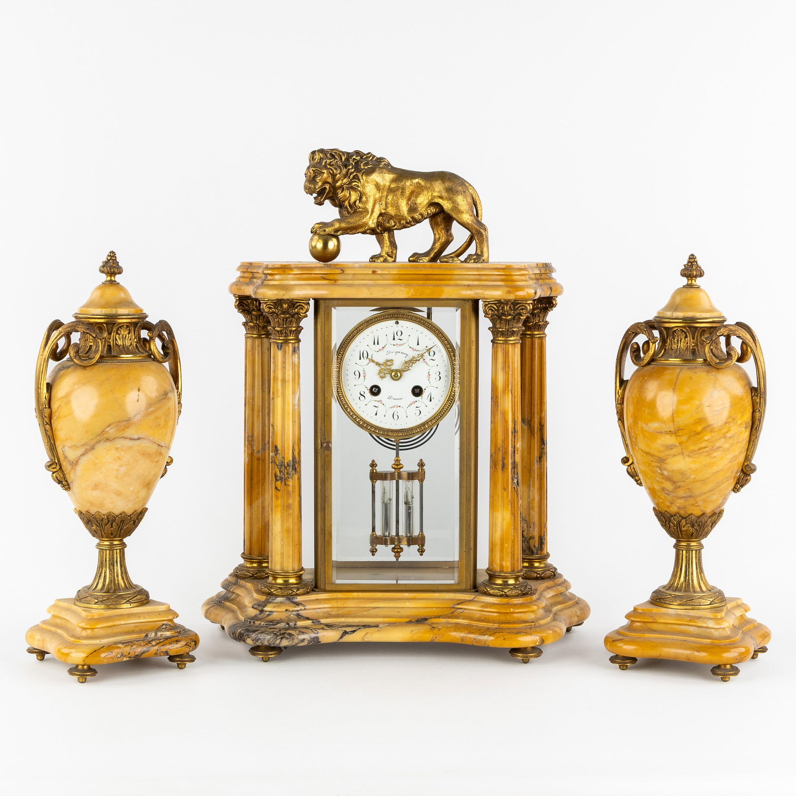 A Three-piece Mantel Garniture, clock and cassolettes, bronze and marble, mounted with a Lion, circa (1 of 9)