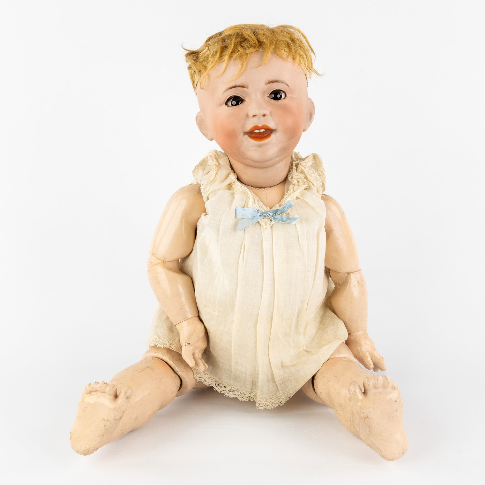 S.F.B.J. Paris 236, a French character doll, 'Laughing Jumeau', biscuit porcelain head and (1 of 9)