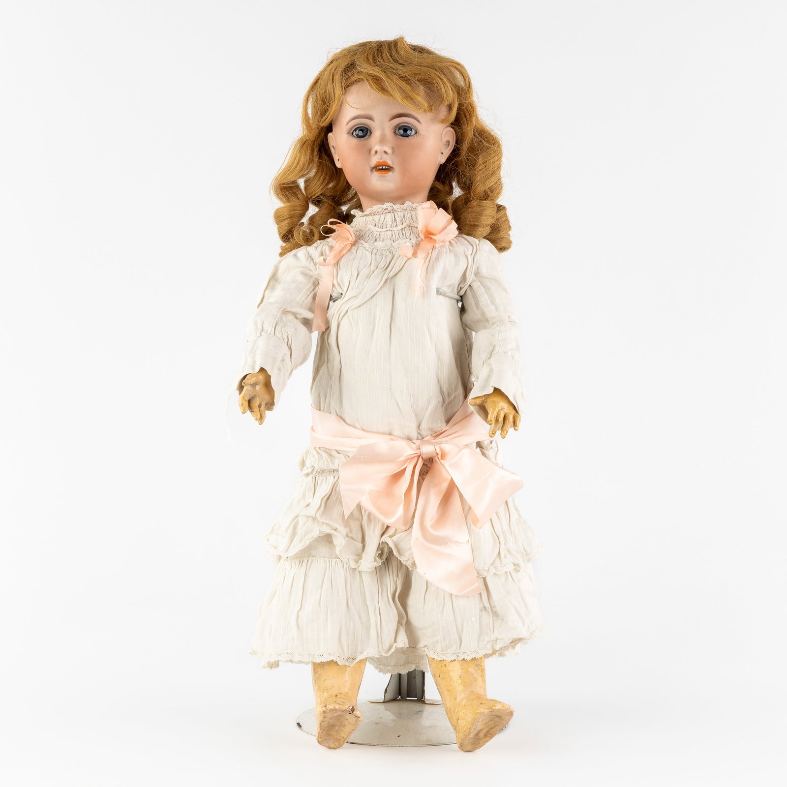 Jumeau 1907, a French doll, biscuit porcelain head and papier-mâché. France, circa 1900. (1 of 7)