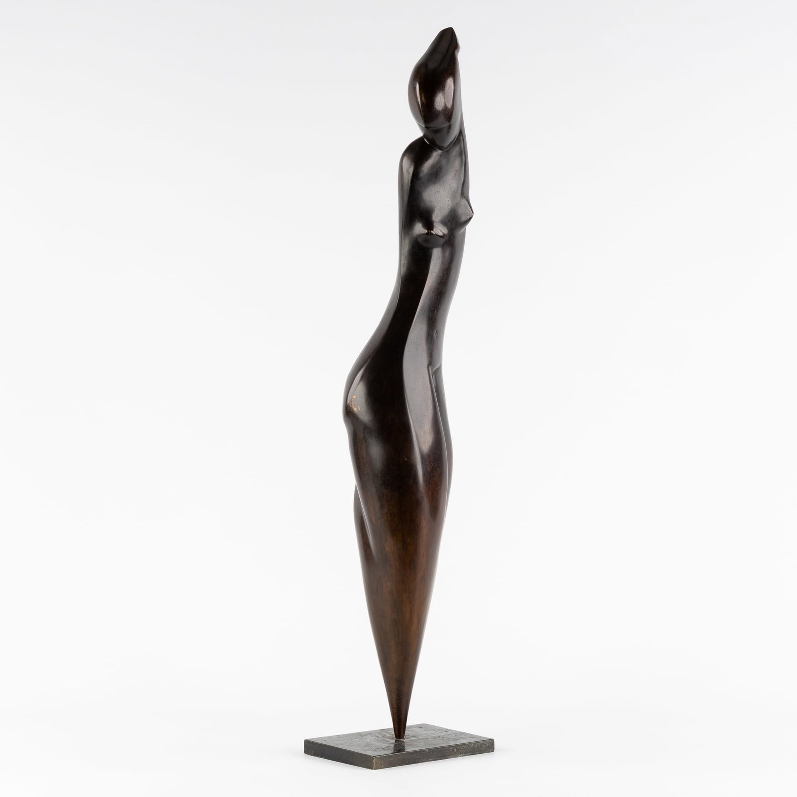 Georges Mesropian (XX) 'Elegant Nude', patinated bronze.: Georges Mesropian (XX) 'Elegant Nude', patinated bronze. Patinated bronze.Signed 'G. Mesropian'.Mounted on a marble base. (18 x 82 x 12.5 cm)
