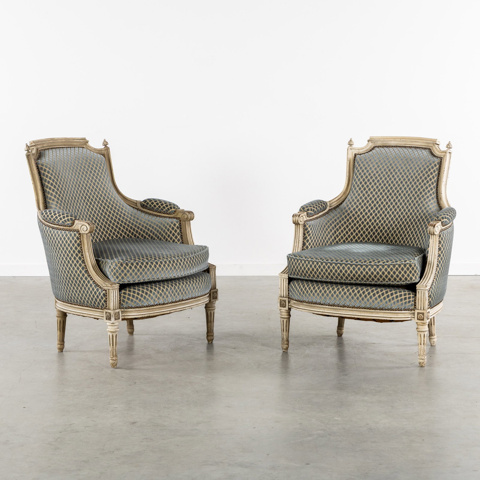 A Pair of Large Armchairs, Sculptured and patinated wood, Louis XVI style, 20th C. (1 of 9)