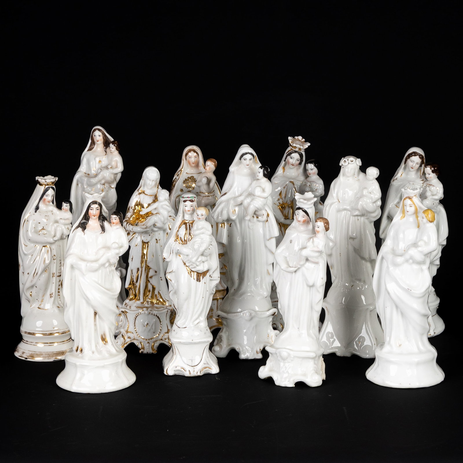 A Collection of 12 porcelain statues of Virgin Mary, 'Madonna and Child', Vieux Bruxelles/Paris, (1 of 12)