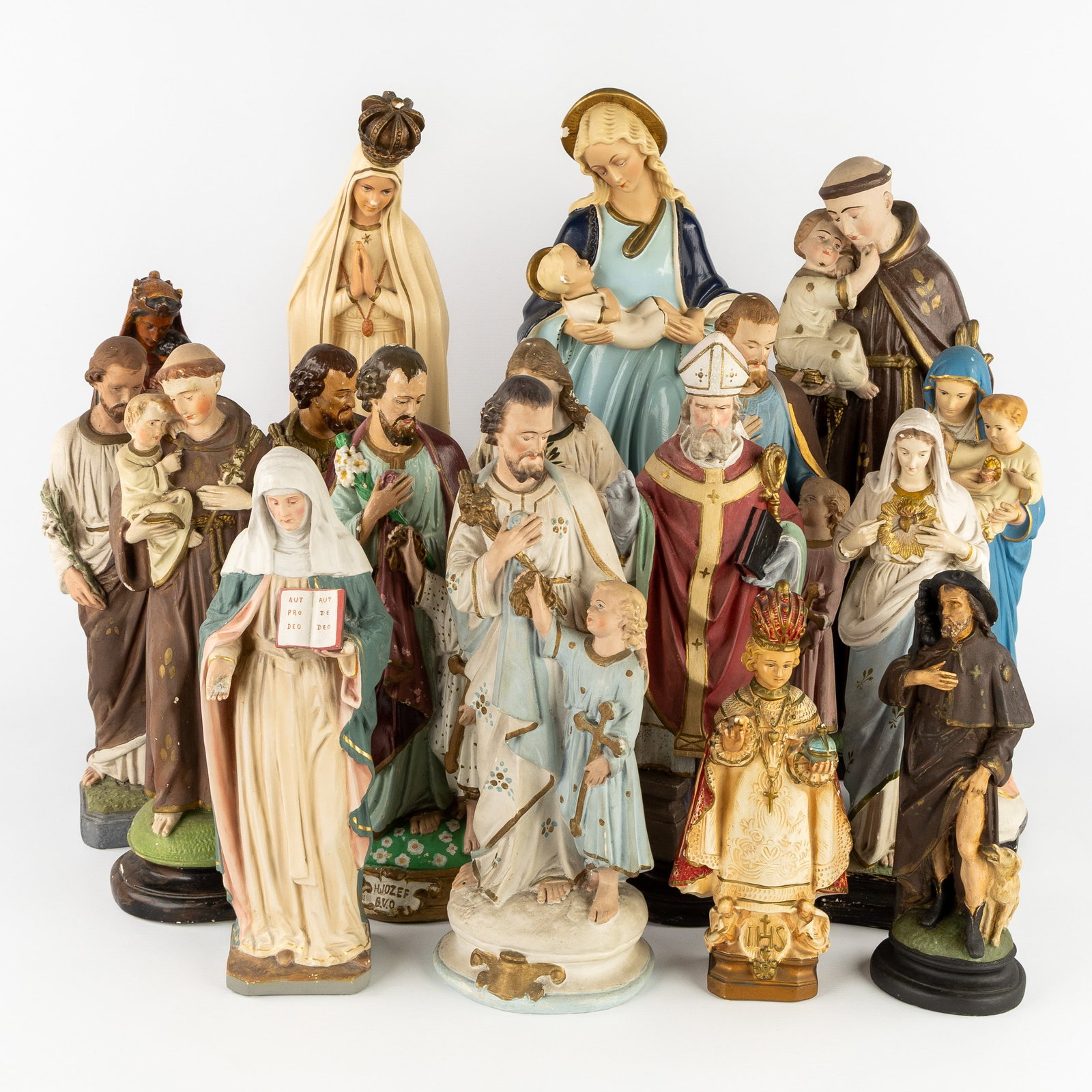 A Collection of 17 statues of Saints, patinated plaster, Anthony of Padua, Eligius, Roch, Immaculate (1 of 7)