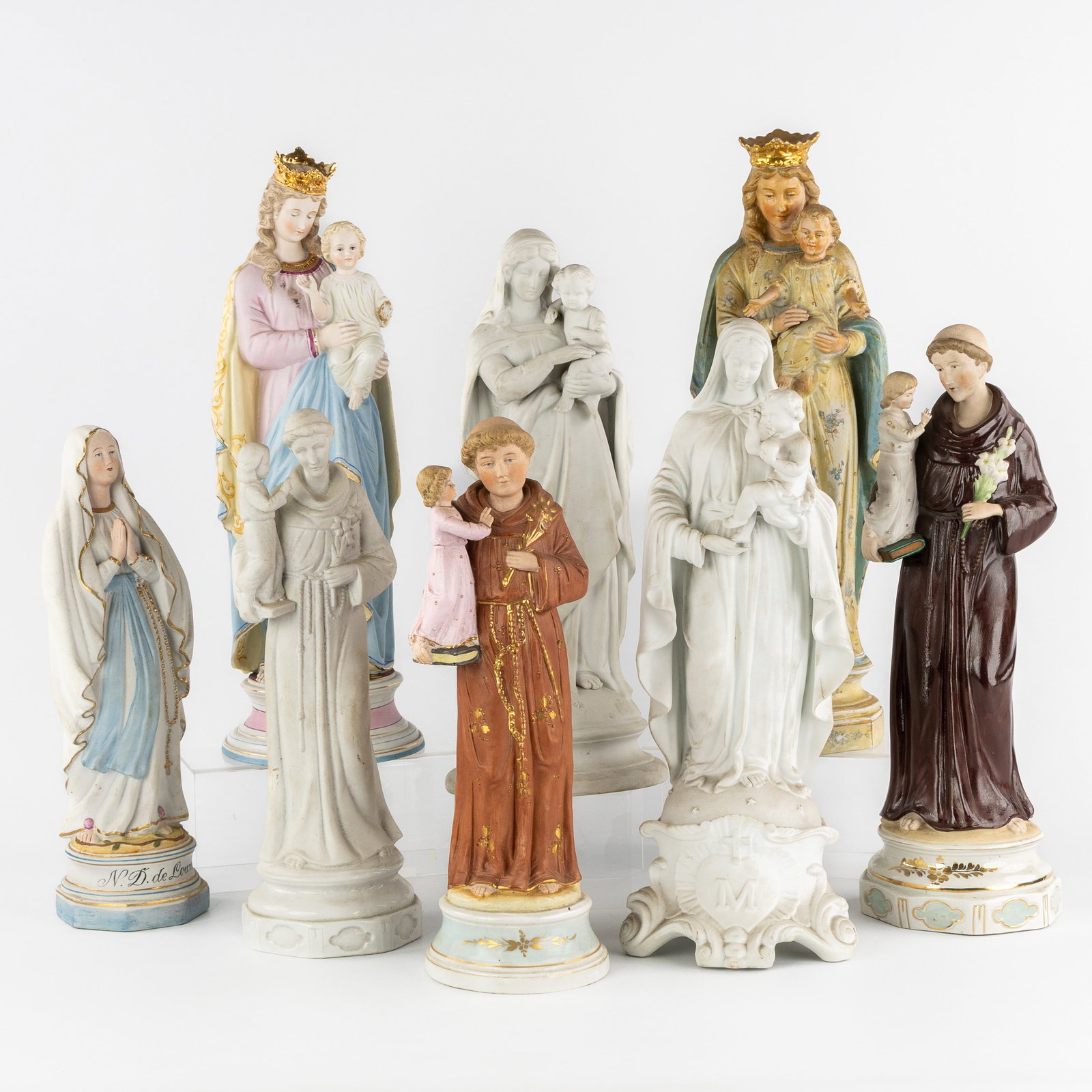 A Collection of 8 Saints Figurines, Madonna and Child, Our Lady of Lourdes and Saint Anthony of (1 of 12)