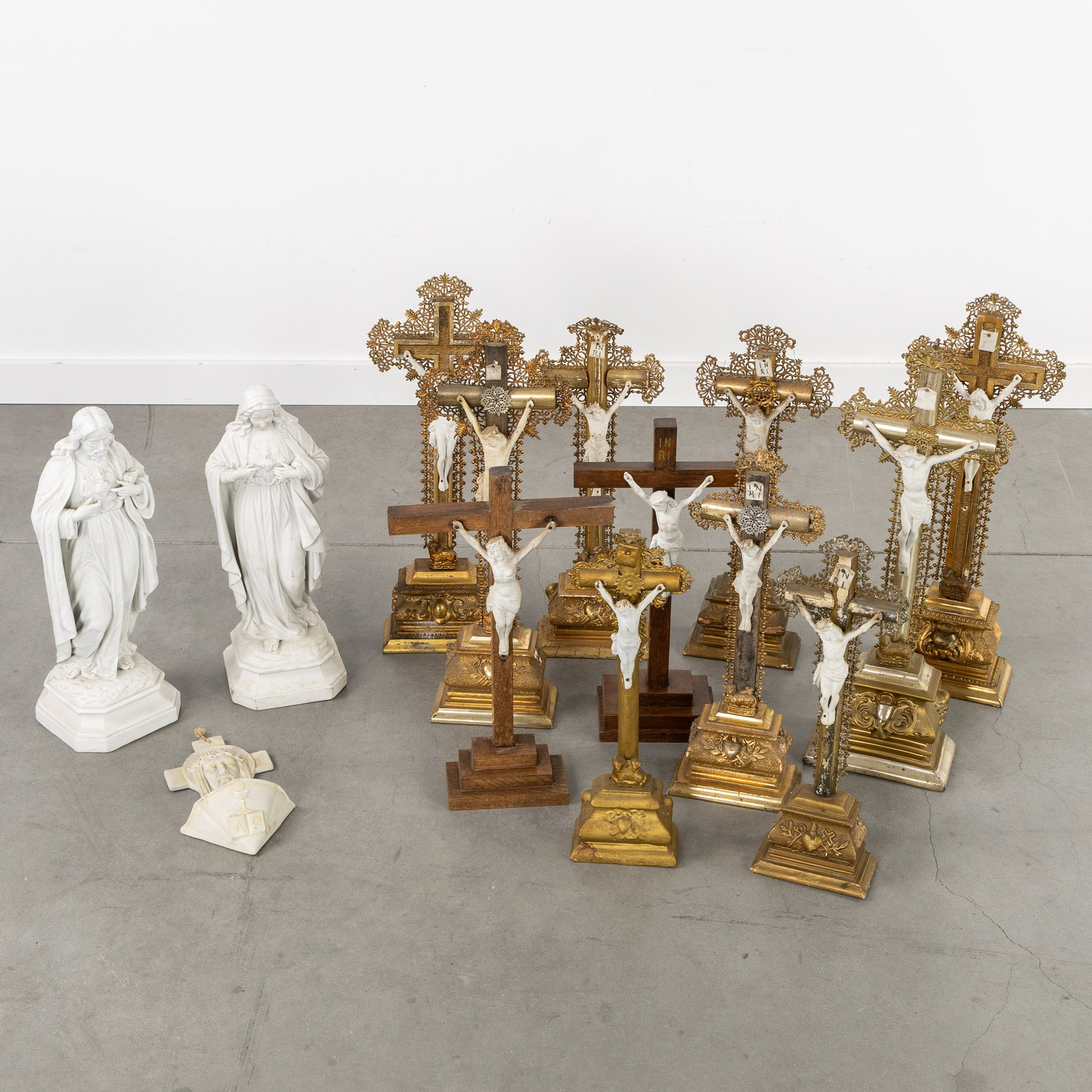 A Collection of 11 altar crucifixes with biscuit porcelain Corpus Christi, two Sacred Heart (1 of 9)
