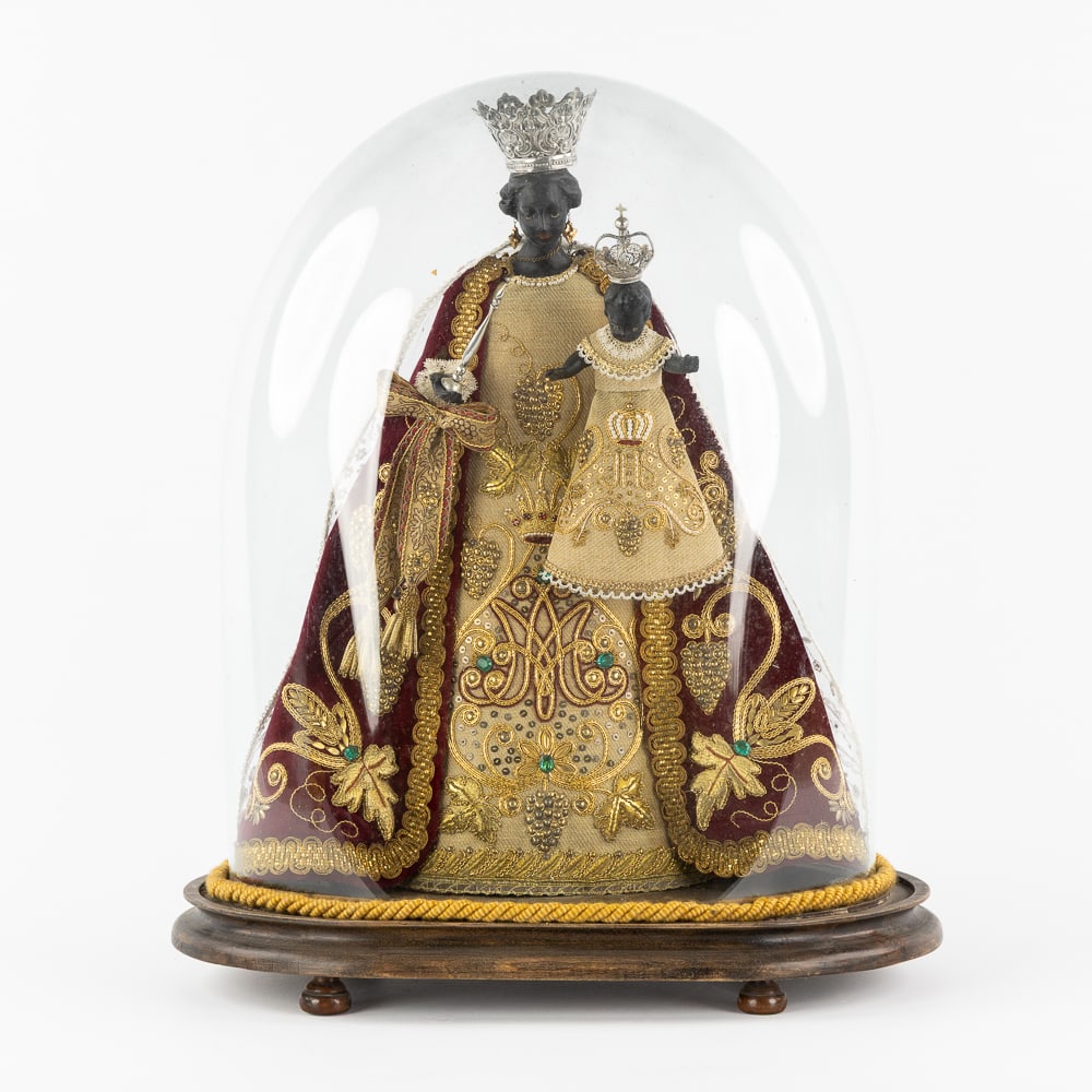 A Black Madonna and Child, wax figurine, silver crowns and scepter, robe with thick gold thread (1 of 7)