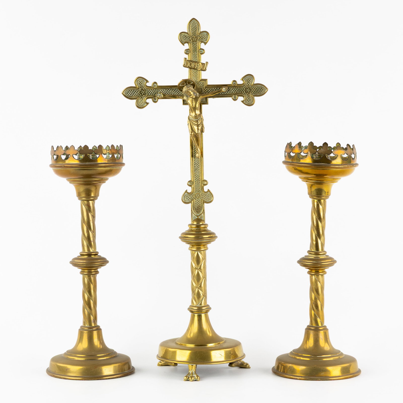A Gothic Revival altar crucifix and candlesticks, mounted with Corpus Christi, in the style of (1 of 8)