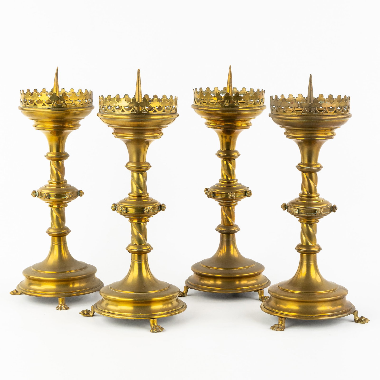 Four church candlesticks, brass in Gothic Revival style. Circa 1900. (1 of 5)