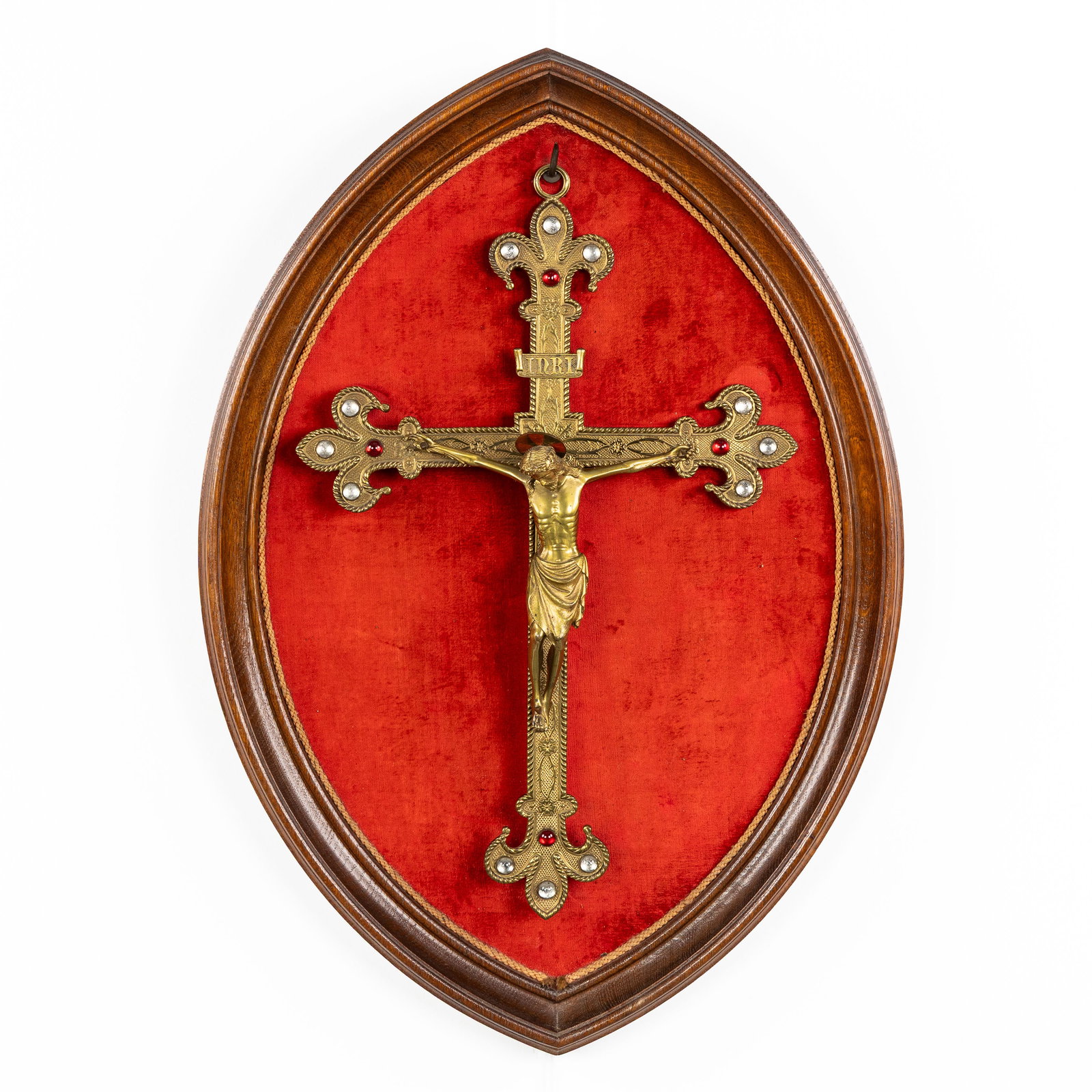 A gilded bronze crucifix with the Corpus Christi, finished with cabochons, Gothic Revival.: A gilded bronze crucifix with the Corpus Christi, finished with cabochons, Gothic Revival. A gilded bronze crucifix with the Corpus Christi, finished with cabochons,