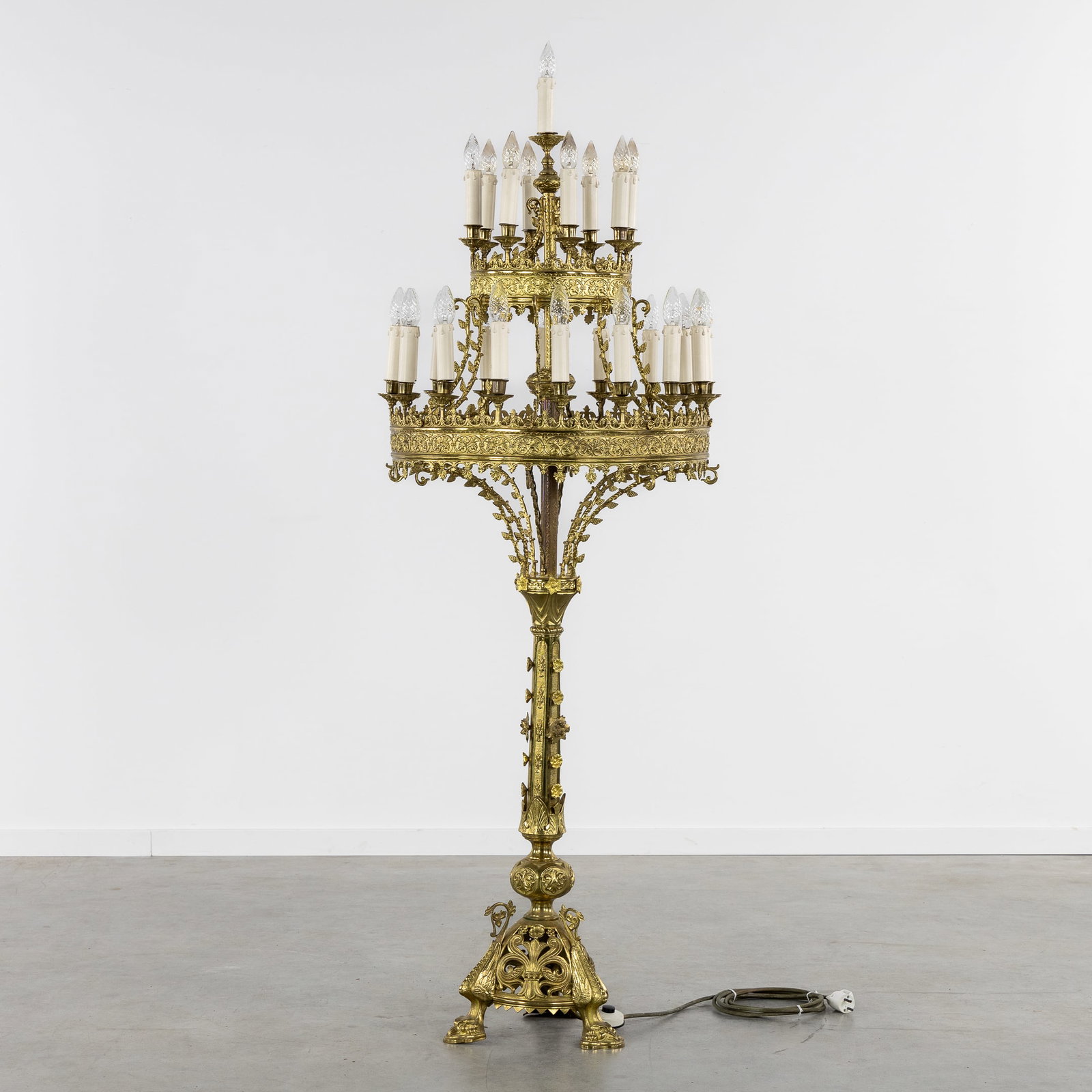 A Large Gothic Revival Church Candelabra with Three Tiers, Gilded Brass, Richly and Finely Chiseled: A Large Gothic Revival Church Candelabra with Three Tiers, Gilded Brass, Richly and Finely Chiseled Decorations, Gothic Revival. Gilded brass.Candelabra with three tiers (two rings and a top).Richly