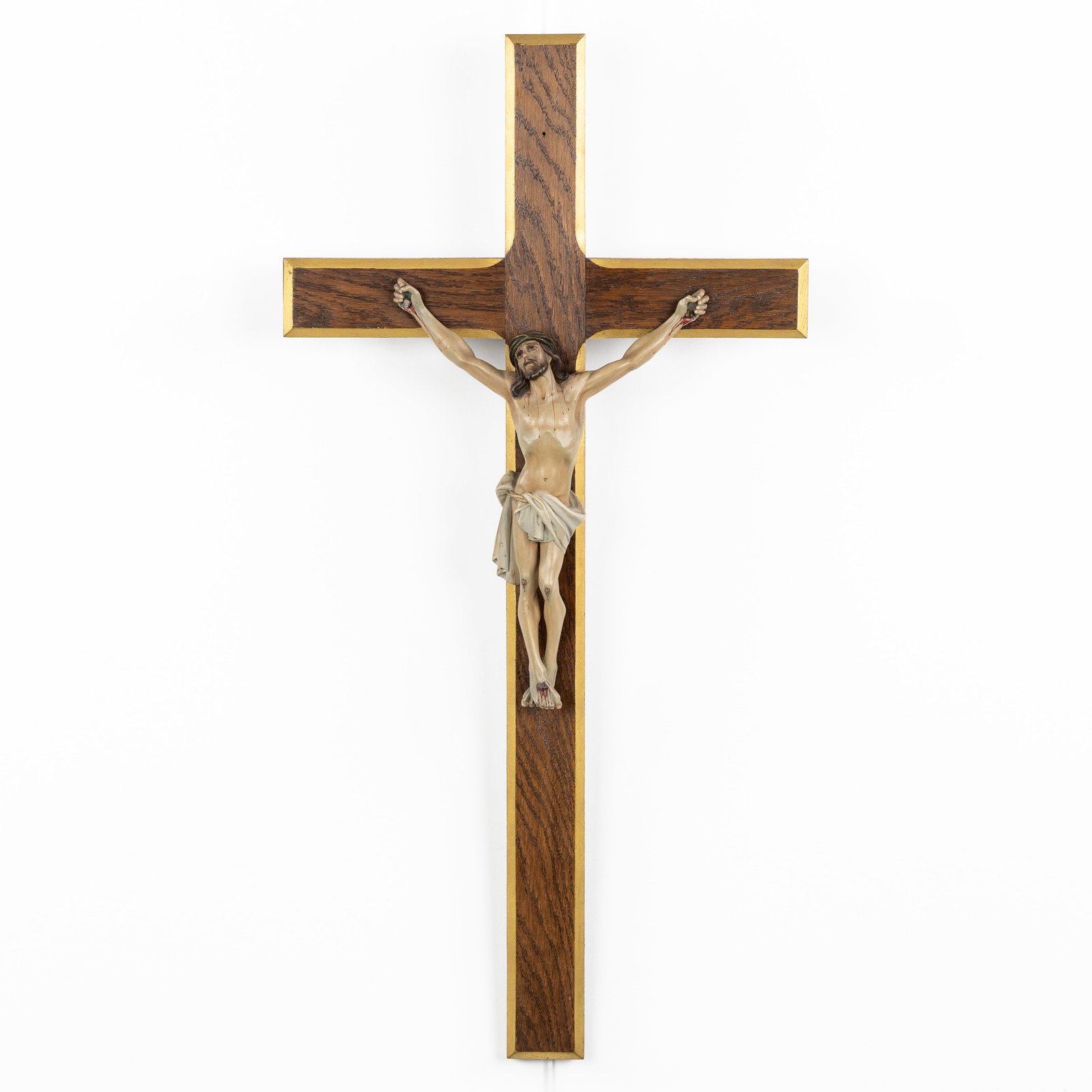 A wood-sculptured and patinated Corpus Christi, mounted on a crucifix. (1 of 4)