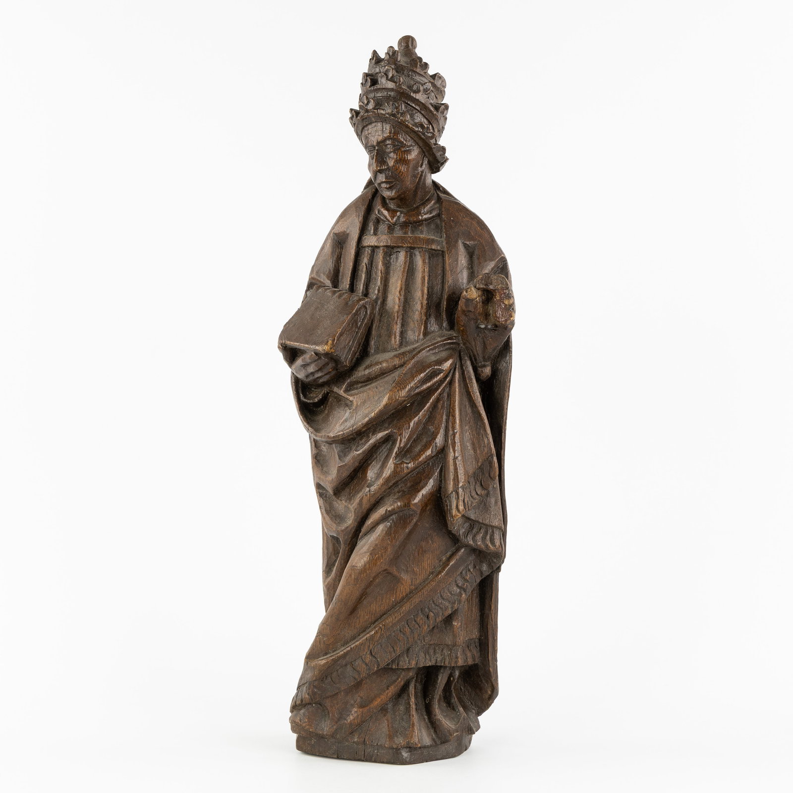 An antique wood-sculptured figurine of a Pope, with Tiara and book. 17th/18th C. (1 of 8)
